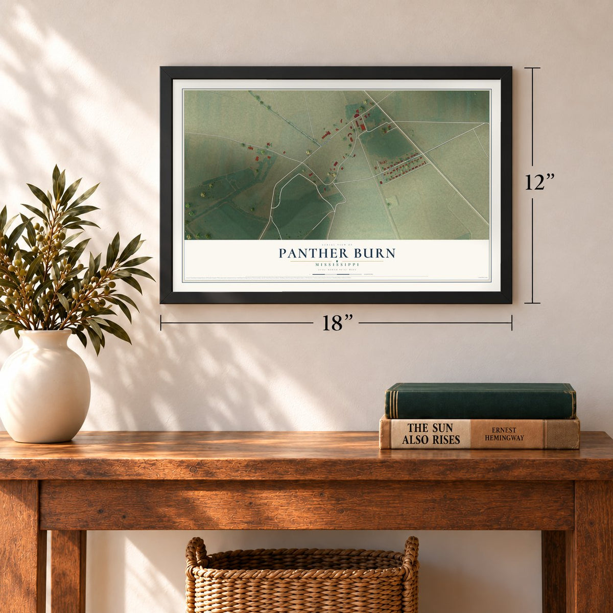 Panther Burn, Mississippi map, 12 x 18 inch print in a black frame in an entryway