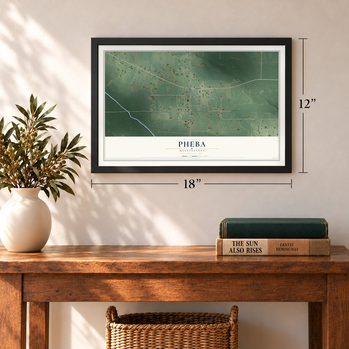 Pheba, Mississippi map, 12 x 18 inch print in a black frame in an entryway