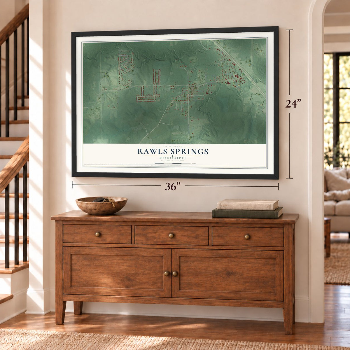 Rawls Springs, Mississippi map, 24 x 36 inch print in a black frame above a dresser by a staircase