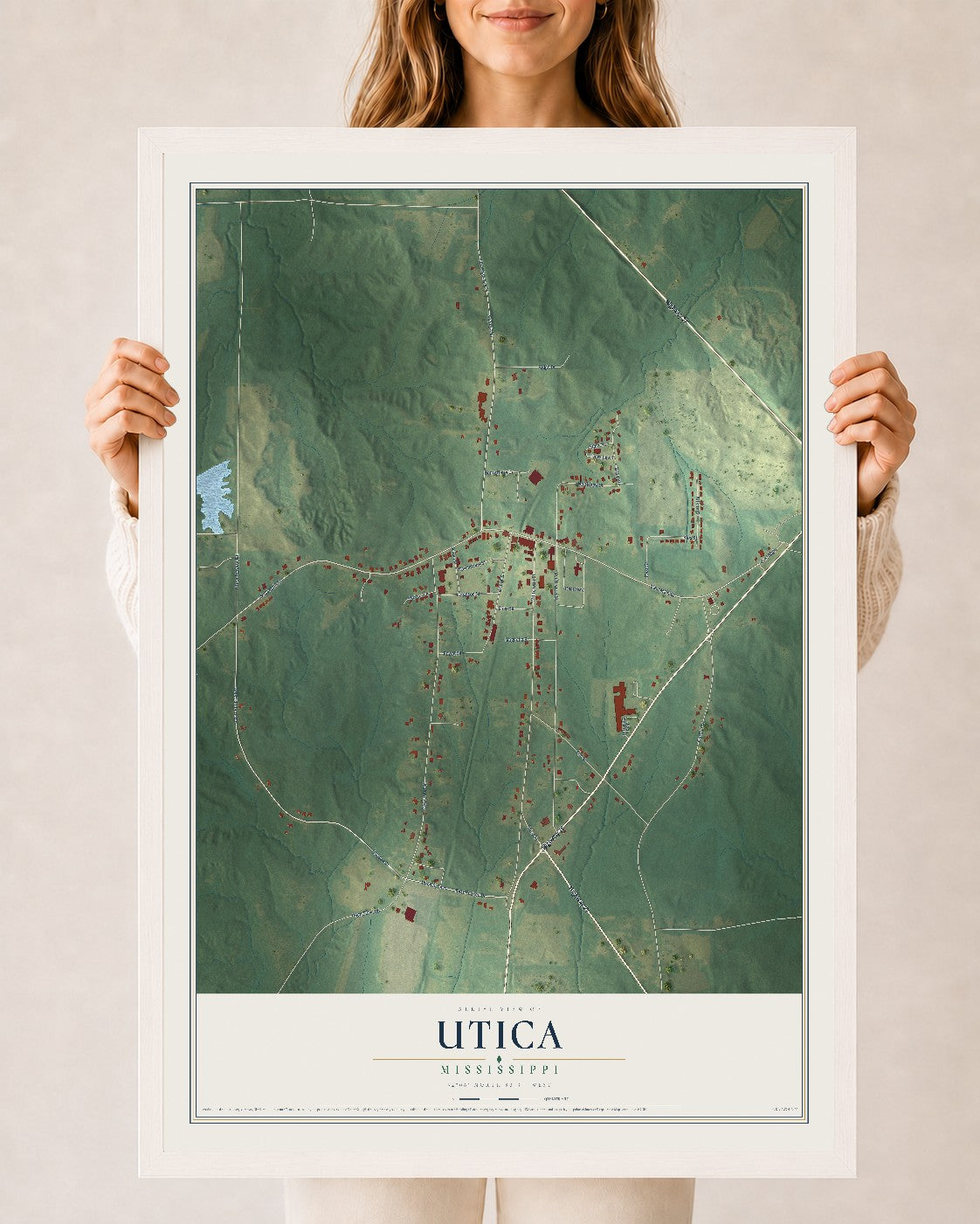 Map of Utica, Mississippi, 24 x 36 inch print in a white wood frame