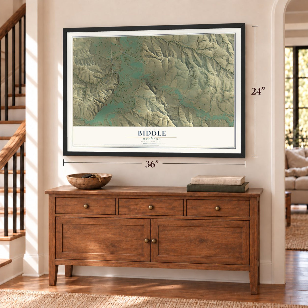 Biddle, Montana map, 24 x 36 inch print in a black frame above a dresser by a staircase