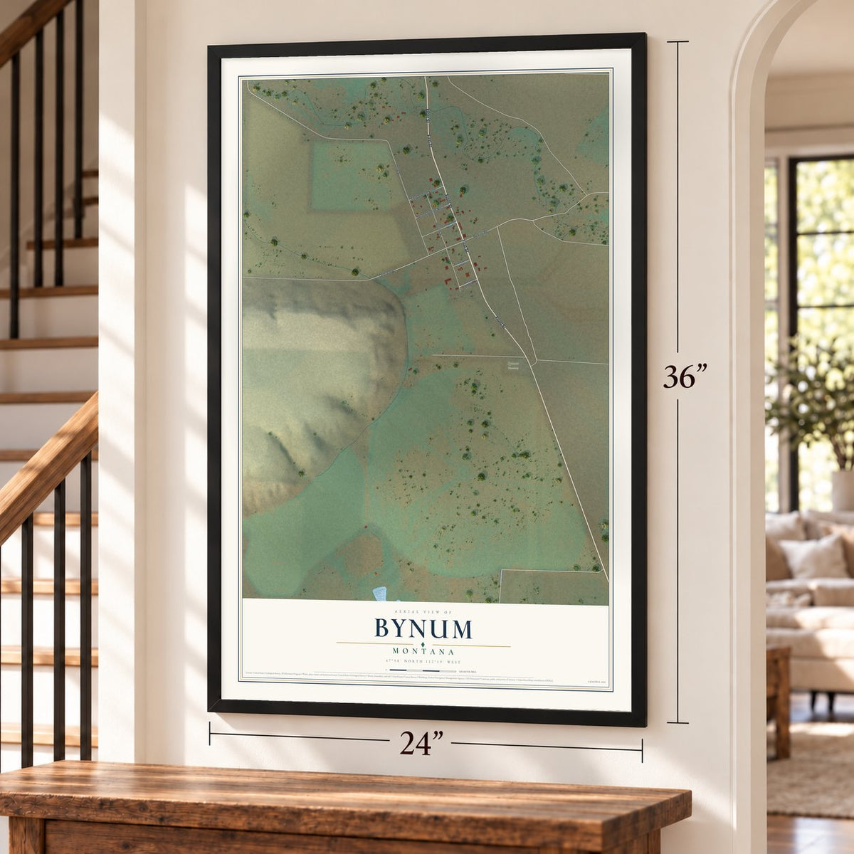 Bynum, Montana map, 24 x 36 inch print in a black frame by a staircase
