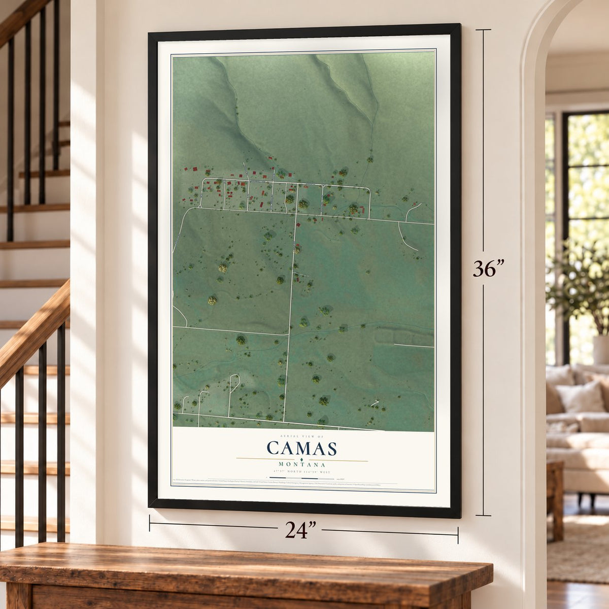 Camas, Montana map, 24 x 36 inch print in a black frame by a staircase