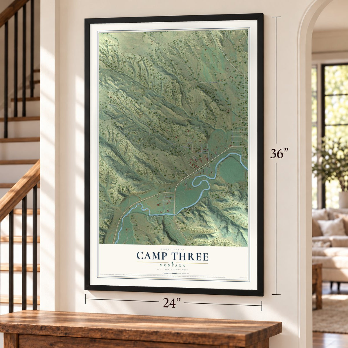 Camp Three, Montana map, 24 x 36 inch print in a black frame by a staircase