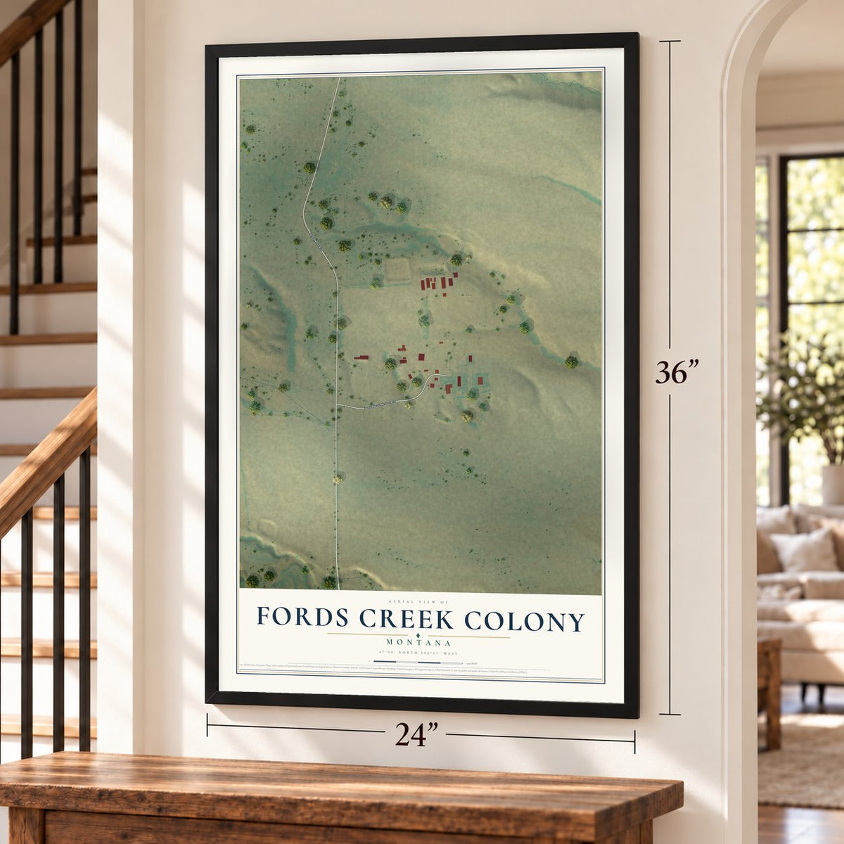 Fords Creek Colony, Montana map, 24 x 36 inch print in a black frame by a staircase