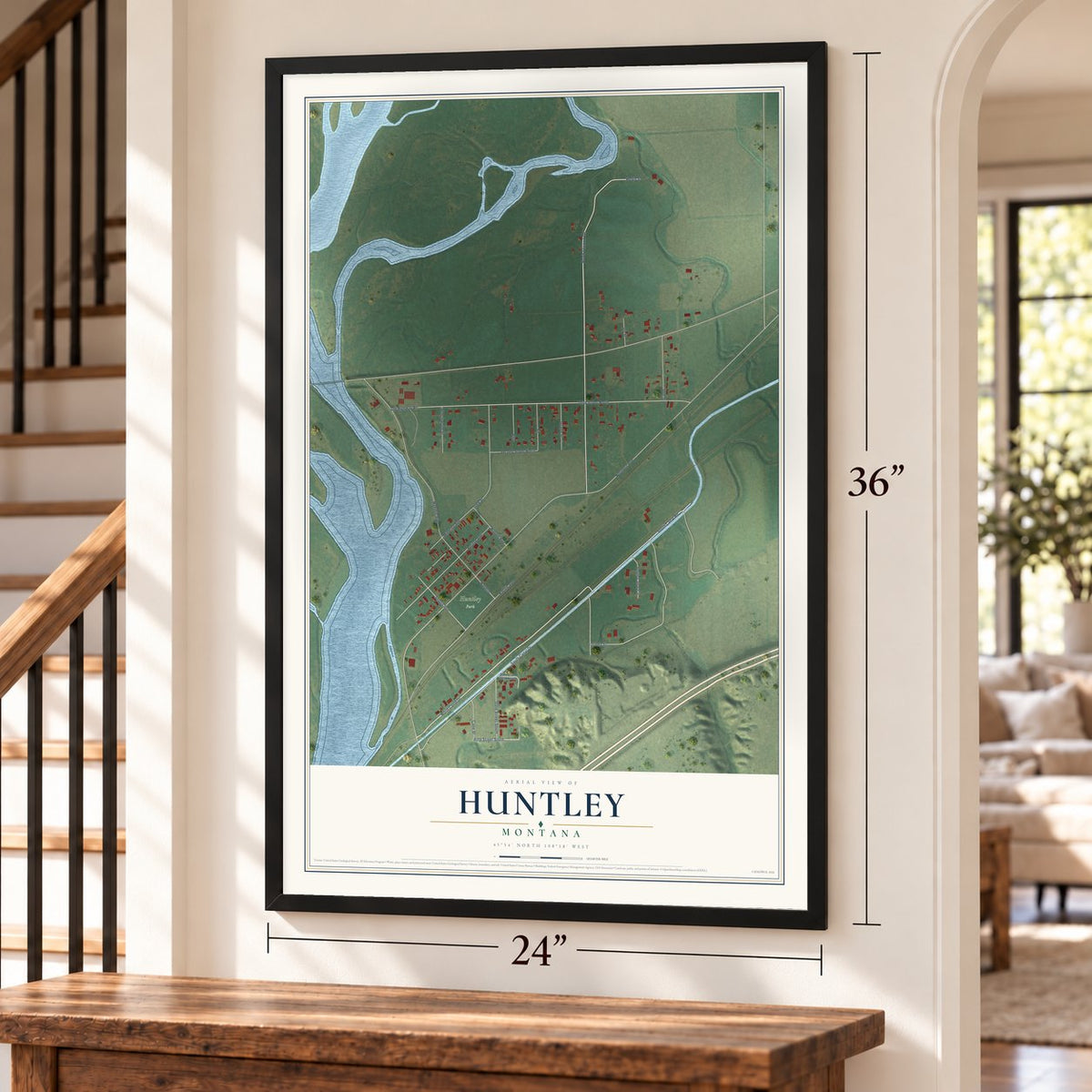Huntley, Montana map, 24 x 36 inch print in a black frame by a staircase