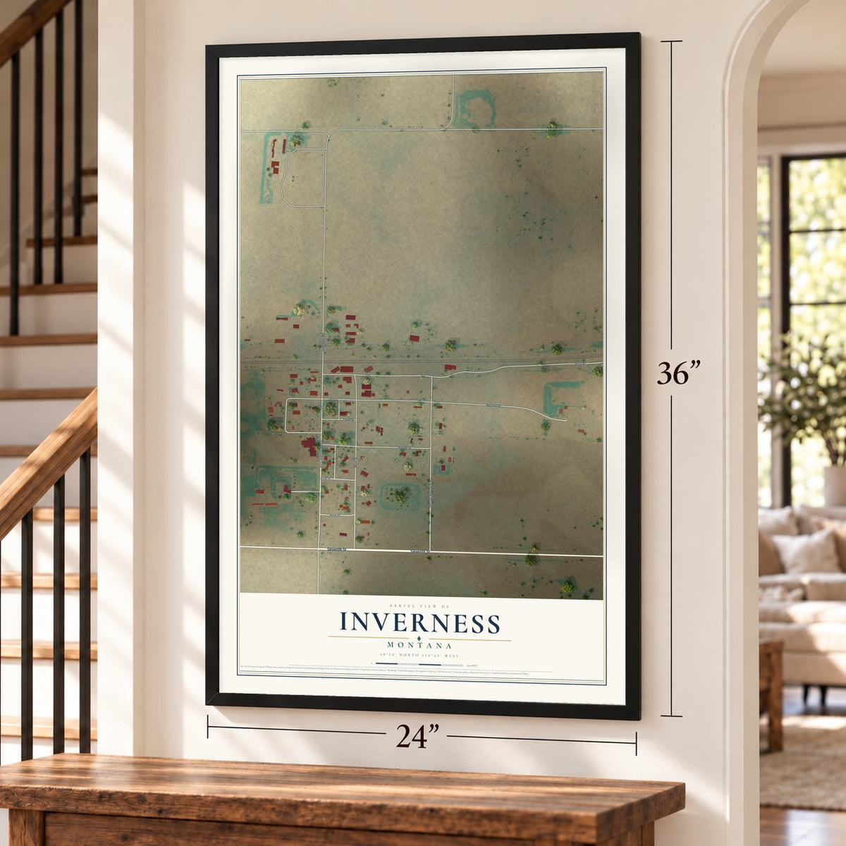 Inverness, Montana map, 24 x 36 inch print in a black frame by a staircase