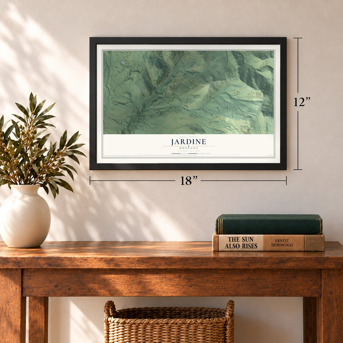Jardine, Montana map, 12 x 18 inch print in a black frame in an entryway