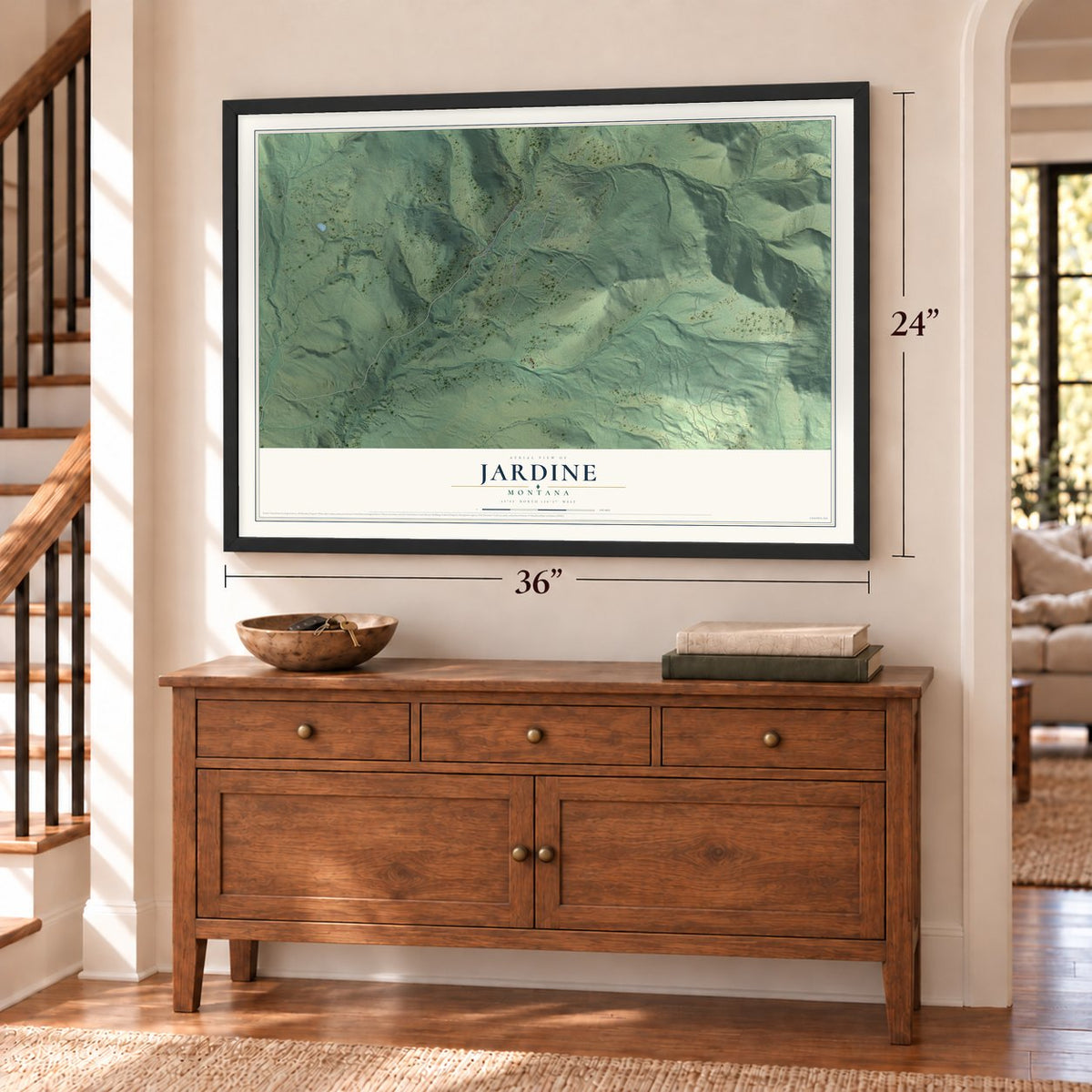 Jardine, Montana map, 24 x 36 inch print in a black frame above a dresser by a staircase