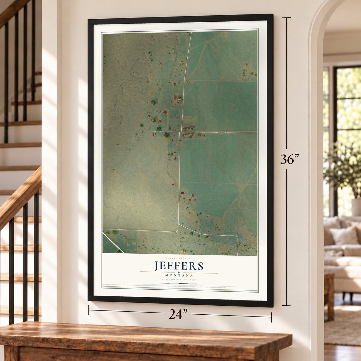 Jeffers, Montana map, 24 x 36 inch print in a black frame by a staircase