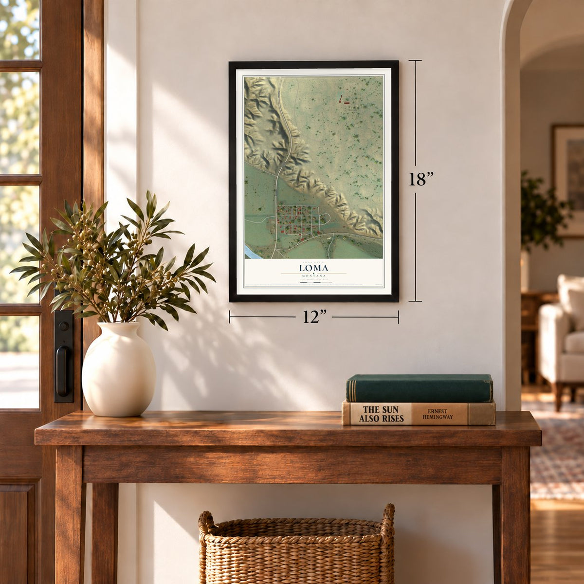 Loma, Montana map, 12 x 18 inch print in a black frame in an entryway