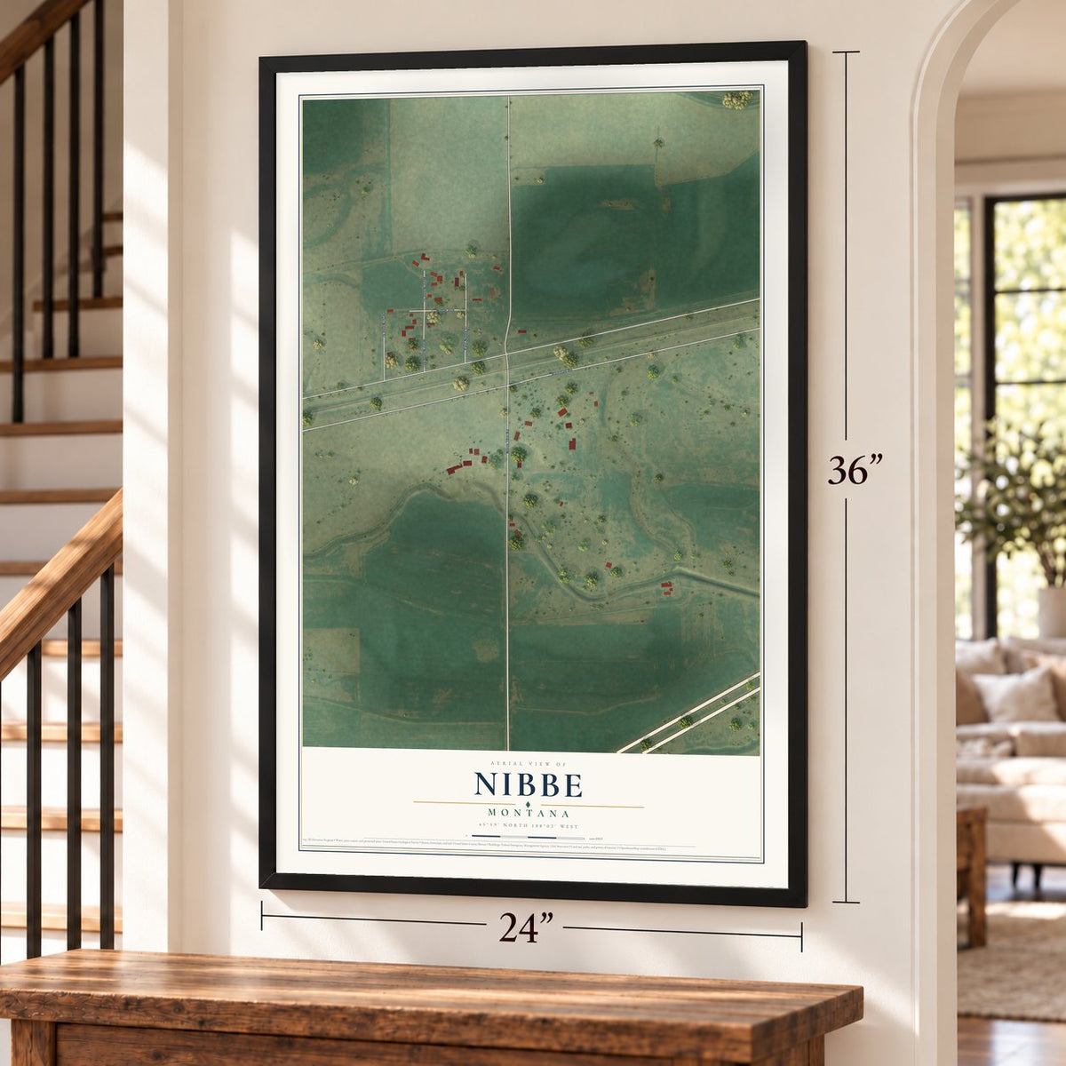 Nibbe, Montana map, 24 x 36 inch print in a black frame by a staircase