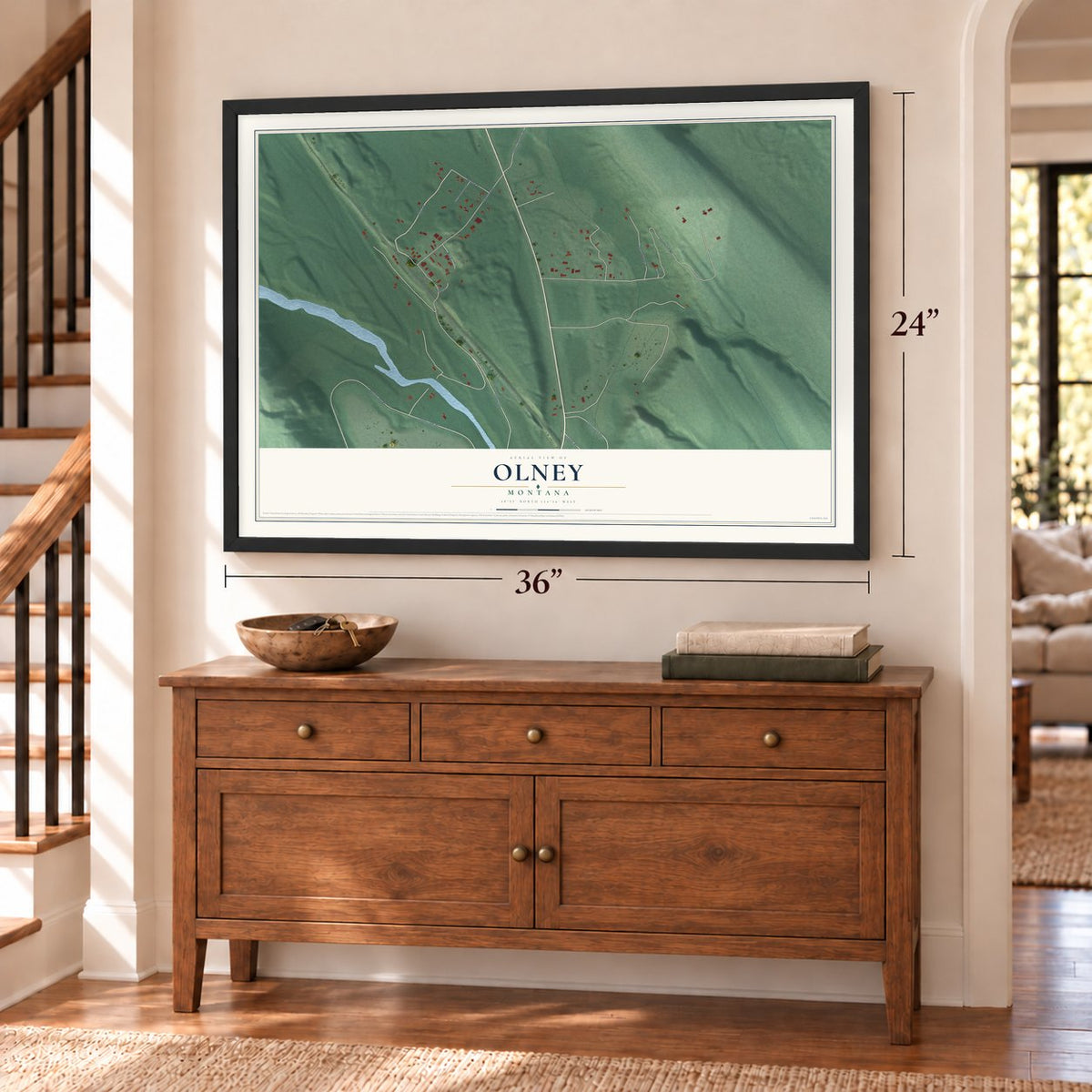 Olney, Montana map, 24 x 36 inch print in a black frame above a dresser by a staircase