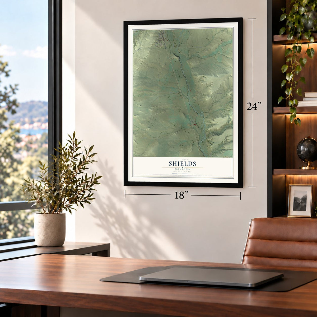 Shields, Montana map, 18 x 24 inch print in a black frame in a home office