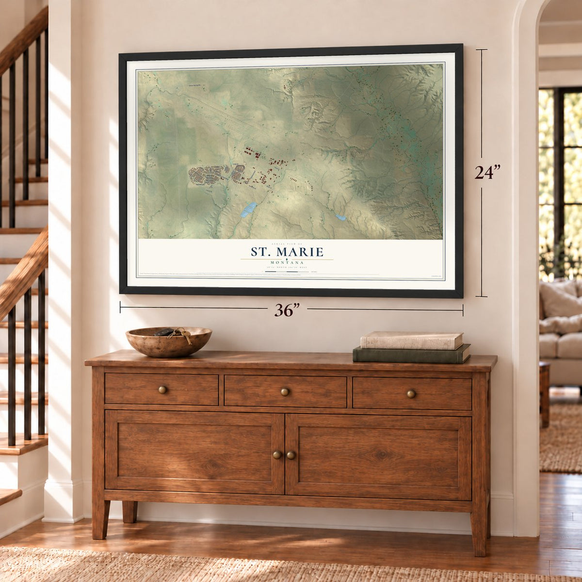 St. Marie, Montana map, 24 x 36 inch print in a black frame above a dresser by a staircase