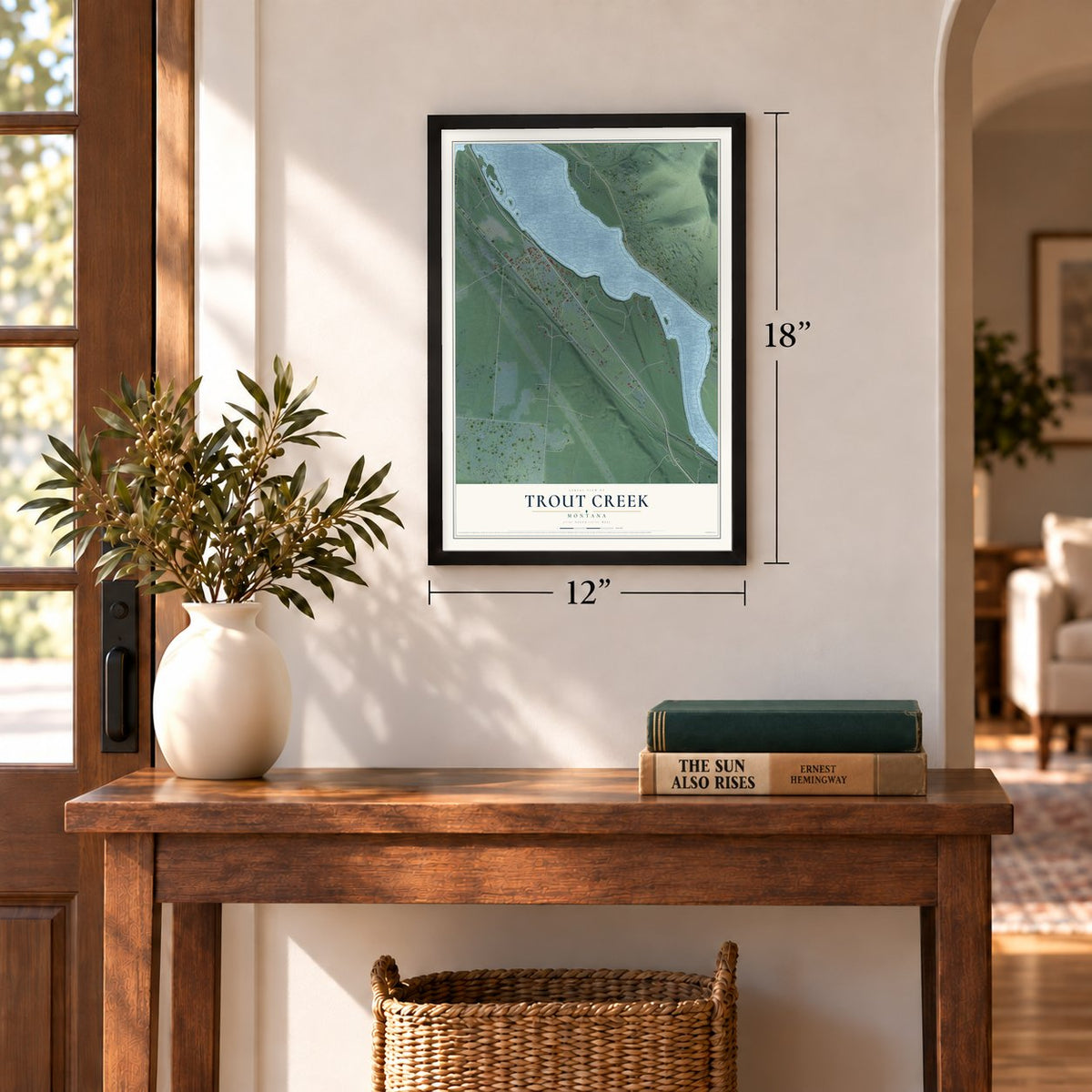 Trout Creek, Montana map, 12 x 18 inch print in a black frame in an entryway