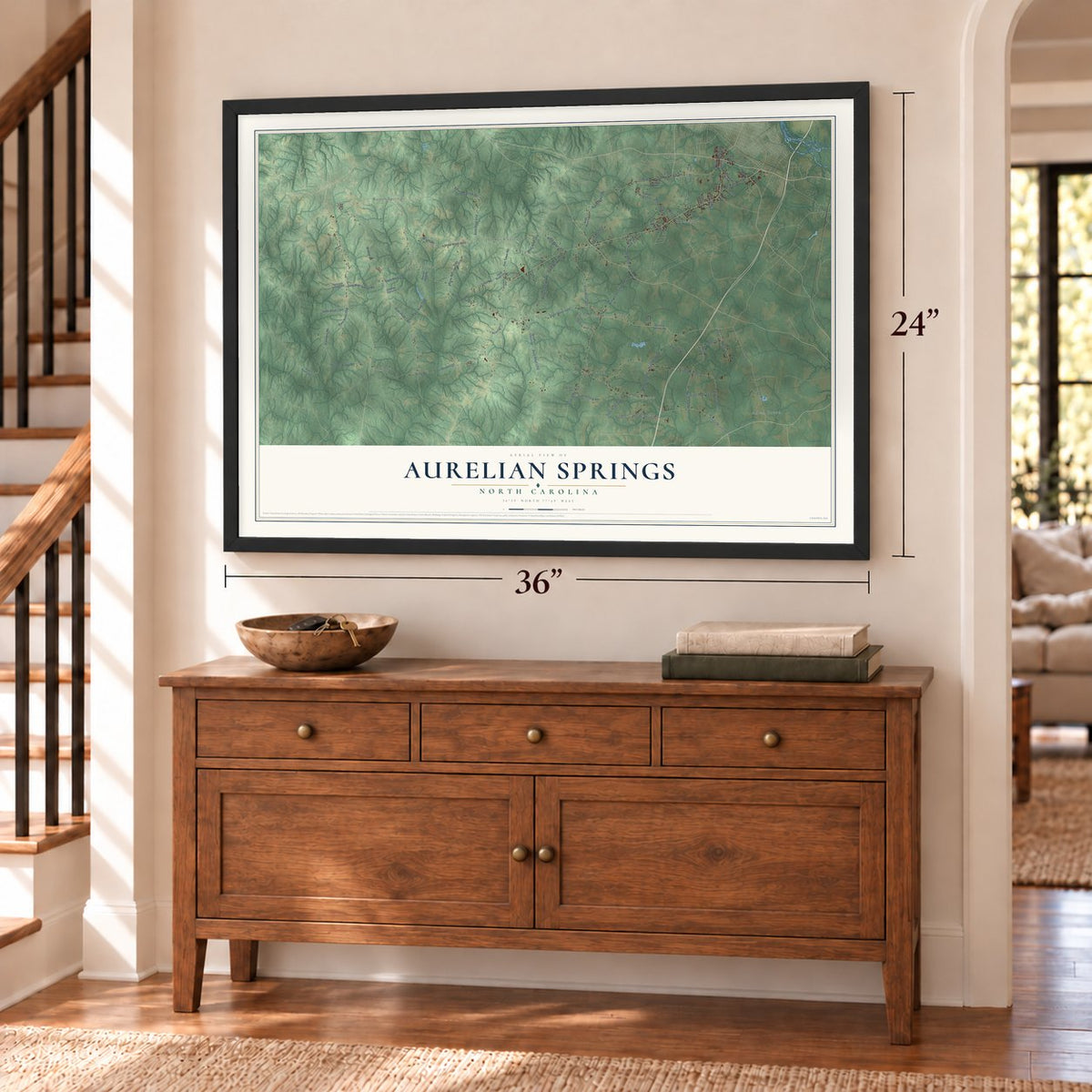 Aurelian Springs, North Carolina map, 24 x 36 inch print in a black frame above a dresser by a staircase