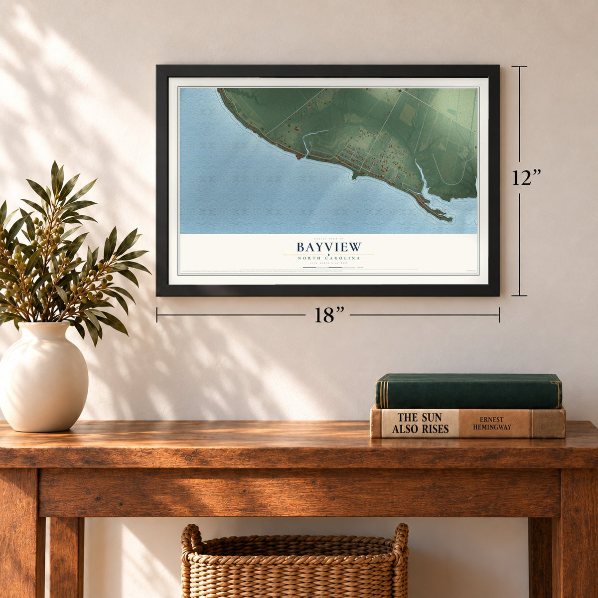 Bayview, North Carolina map, 12 x 18 inch print in a black frame in an entryway