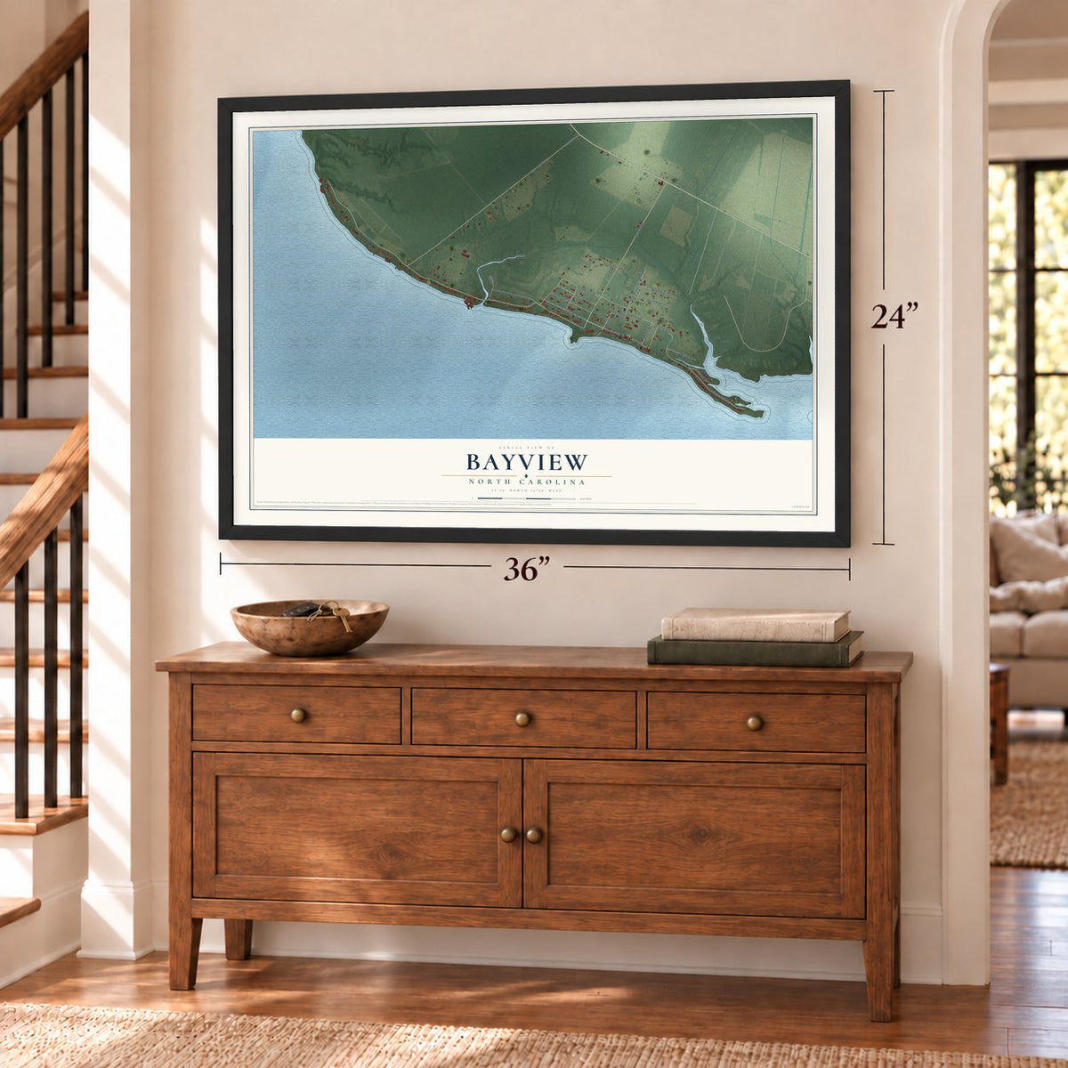 Bayview, North Carolina map, 24 x 36 inch print in a black frame above a dresser by a staircase