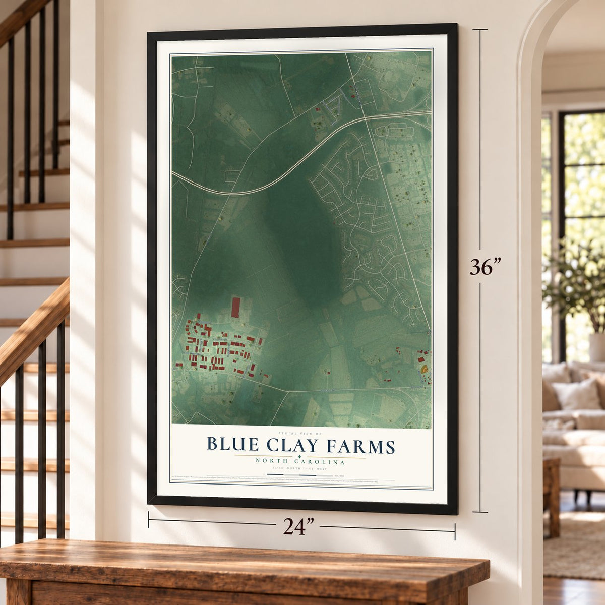 Blue Clay Farms, North Carolina map, 24 x 36 inch print in a black frame by a staircase