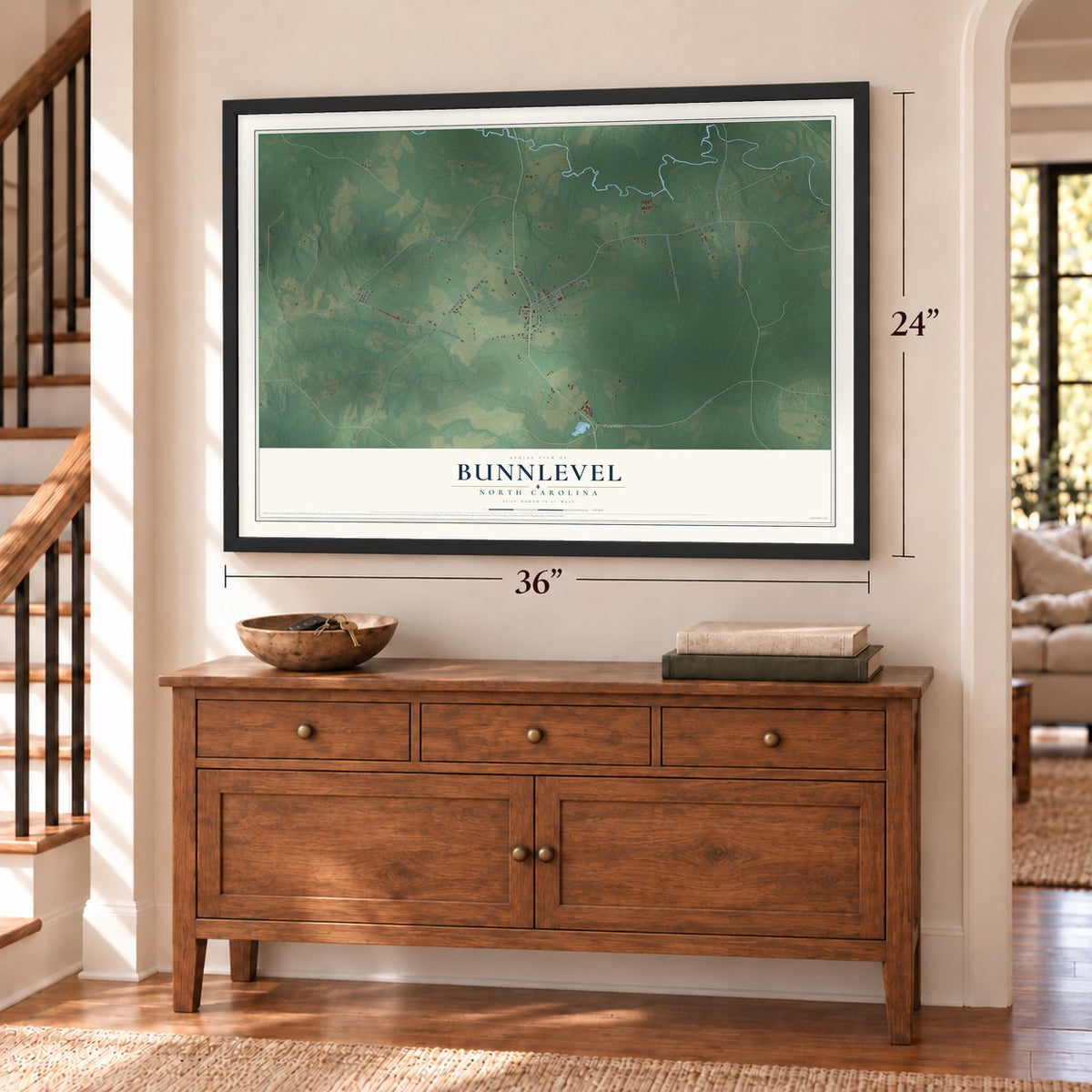 Bunnlevel, North Carolina map, 24 x 36 inch print in a black frame above a dresser by a staircase