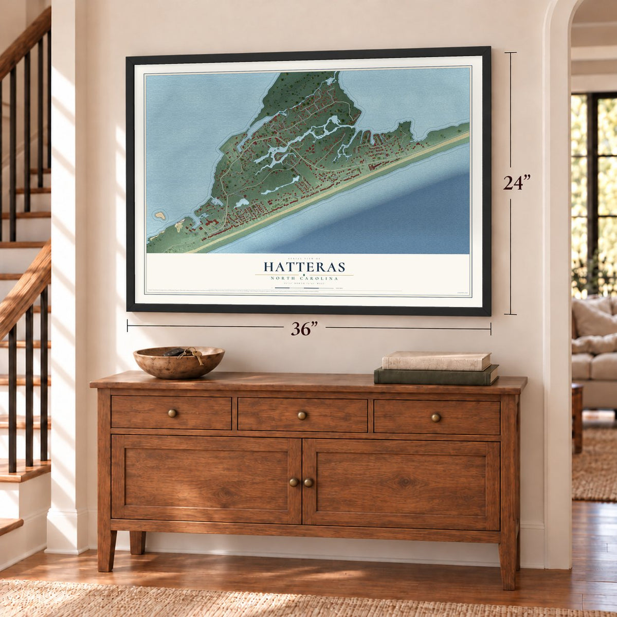 Hatteras, North Carolina map, 24 x 36 inch print in a black frame above a dresser by a staircase