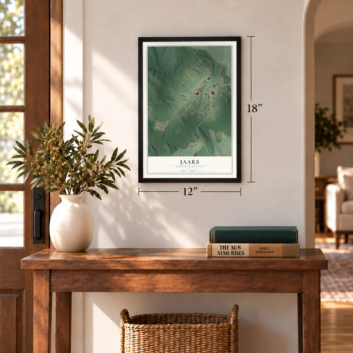 JAARS, North Carolina map, 12 x 18 inch print in a black frame in an entryway