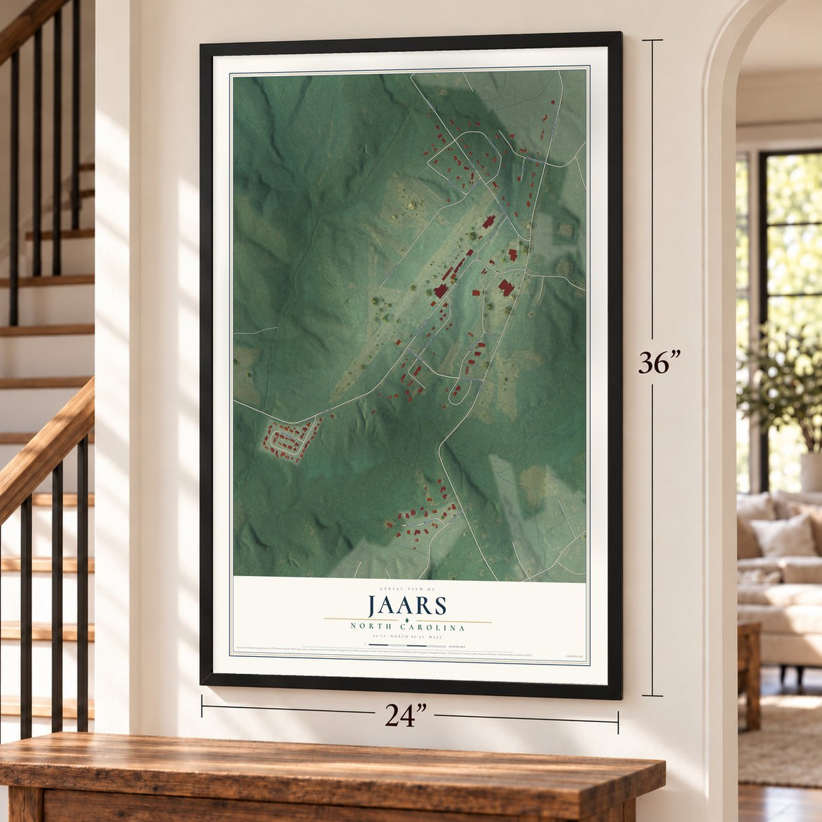 JAARS, North Carolina map, 24 x 36 inch print in a black frame by a staircase