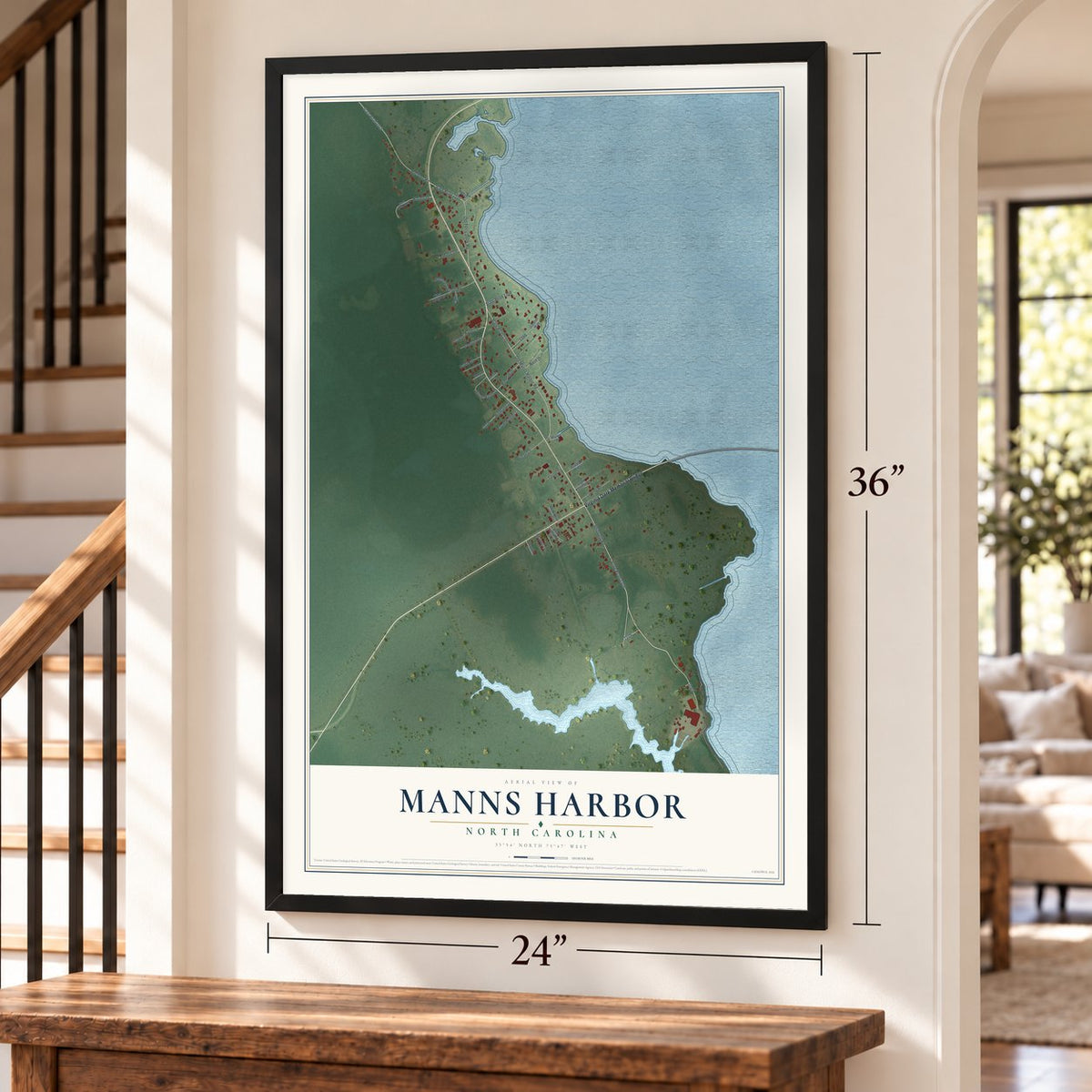 Manns Harbor, North Carolina map, 24 x 36 inch print in a black frame by a staircase