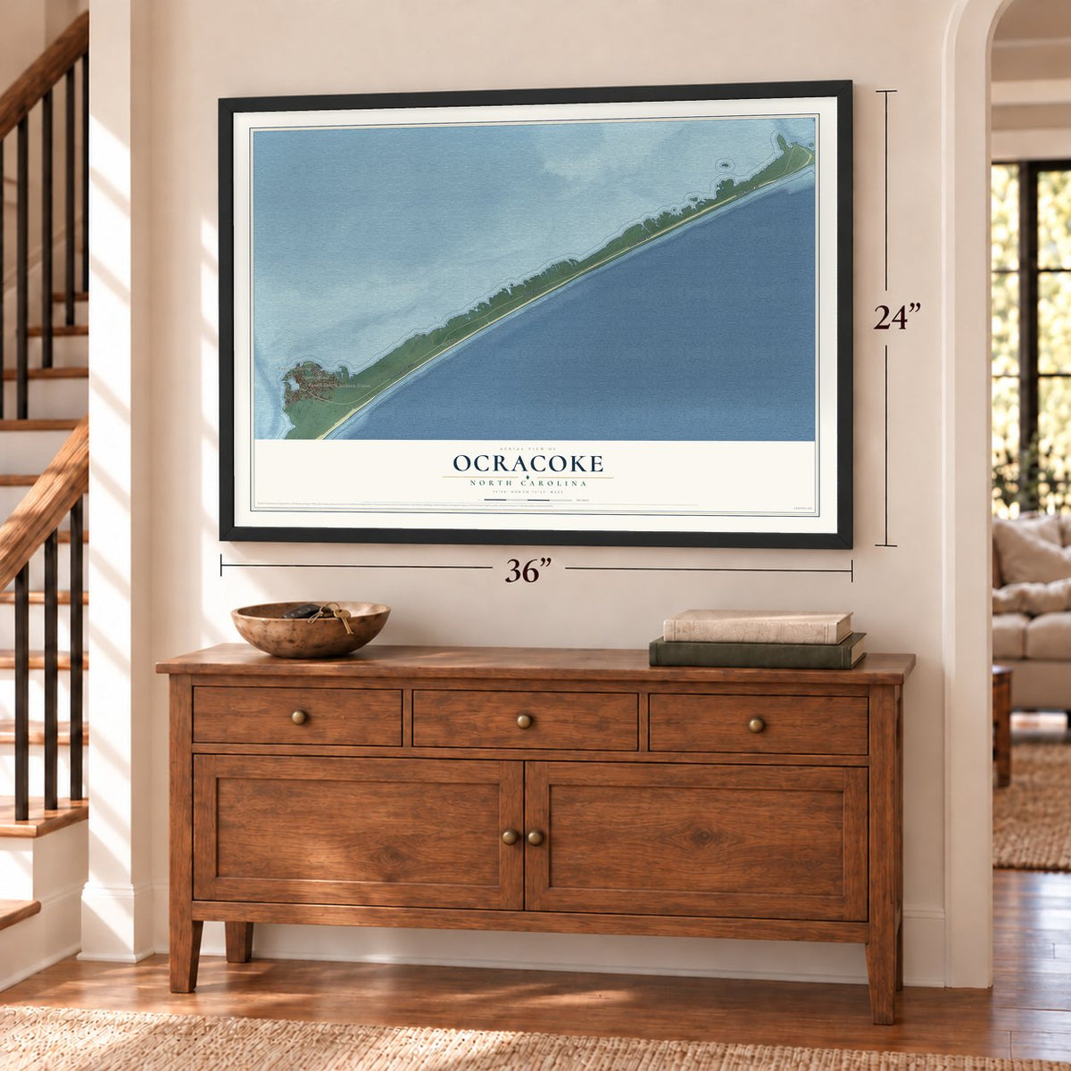 Ocracoke, North Carolina map, 24 x 36 inch print in a black frame above a dresser by a staircase