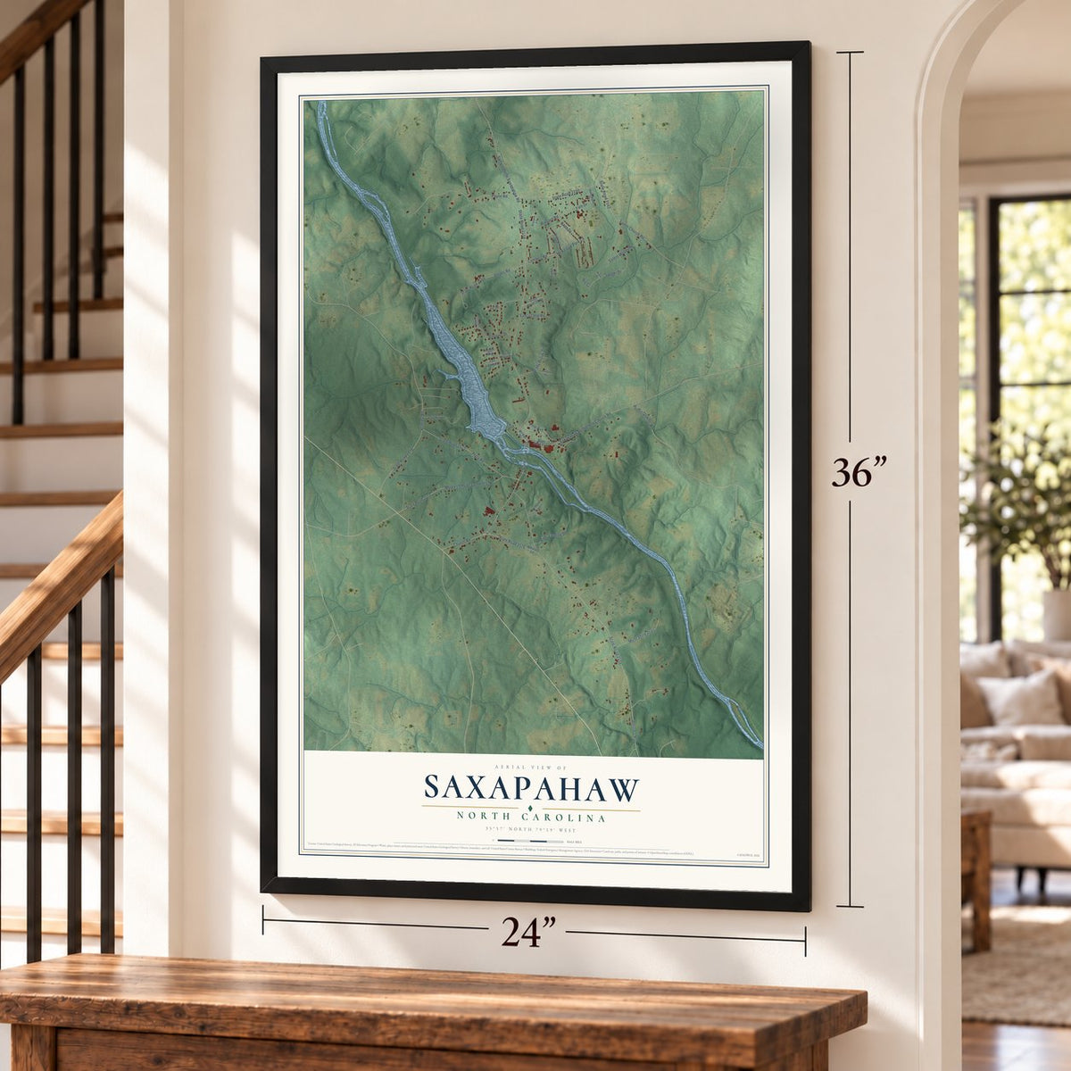 Saxapahaw, North Carolina map, 24 x 36 inch print in a black frame by a staircase