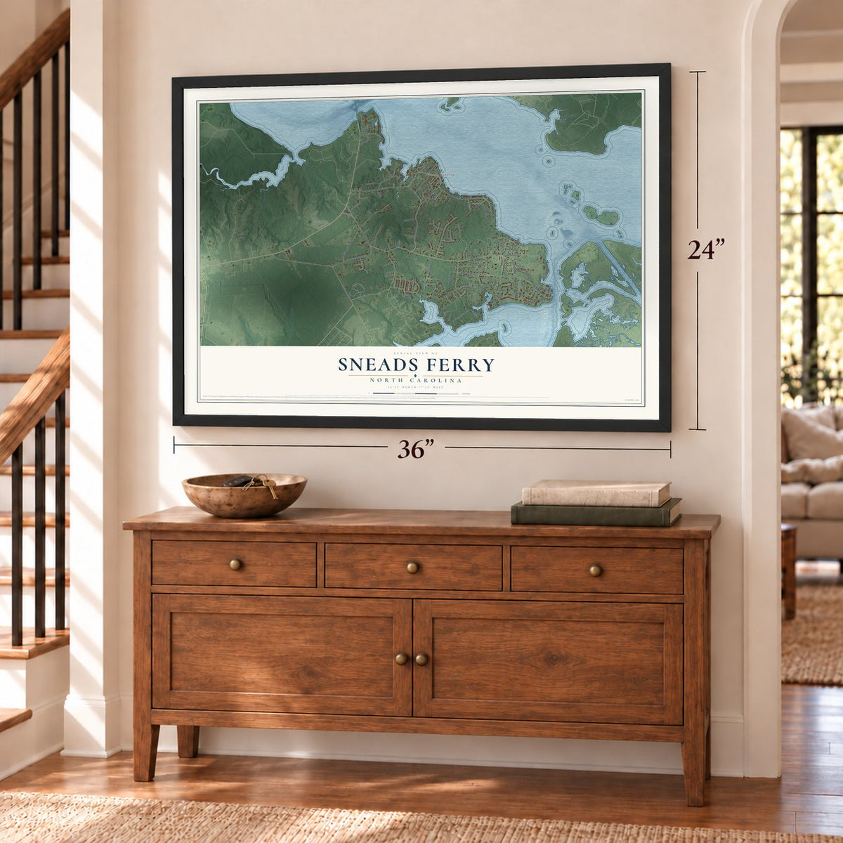 Sneads Ferry, North Carolina map, 24 x 36 inch print in a black frame above a dresser by a staircase