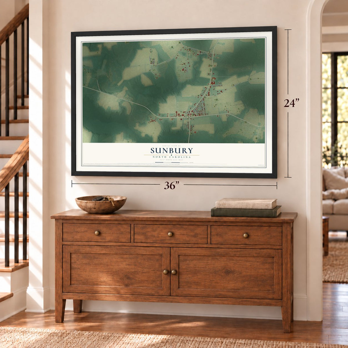 Sunbury, North Carolina map, 24 x 36 inch print in a black frame above a dresser by a staircase