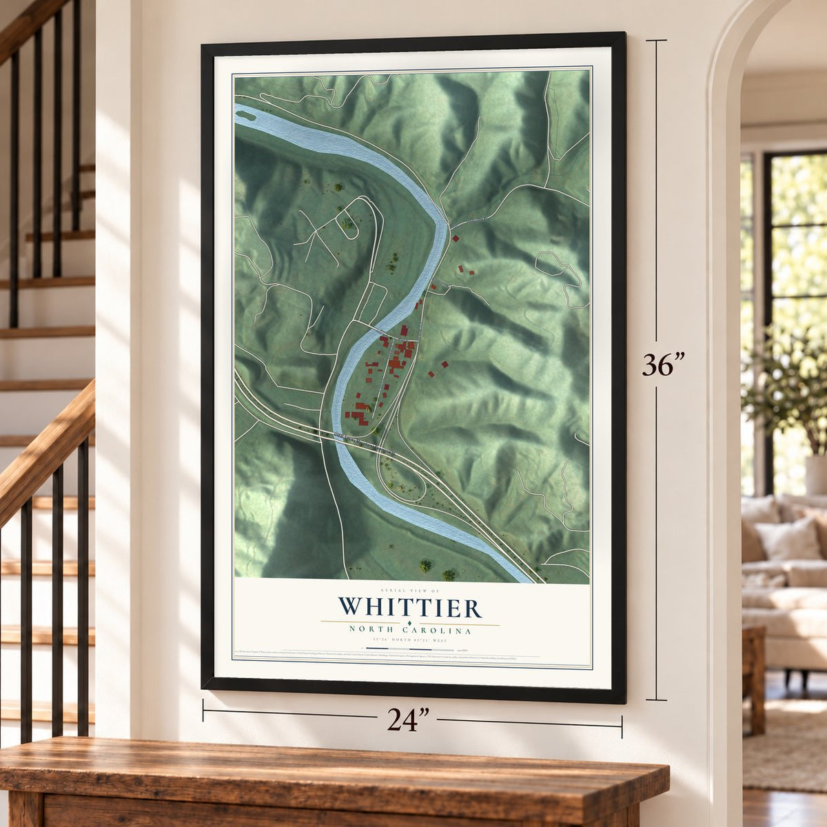 Whittier, North Carolina map, 24 x 36 inch print in a black frame by a staircase