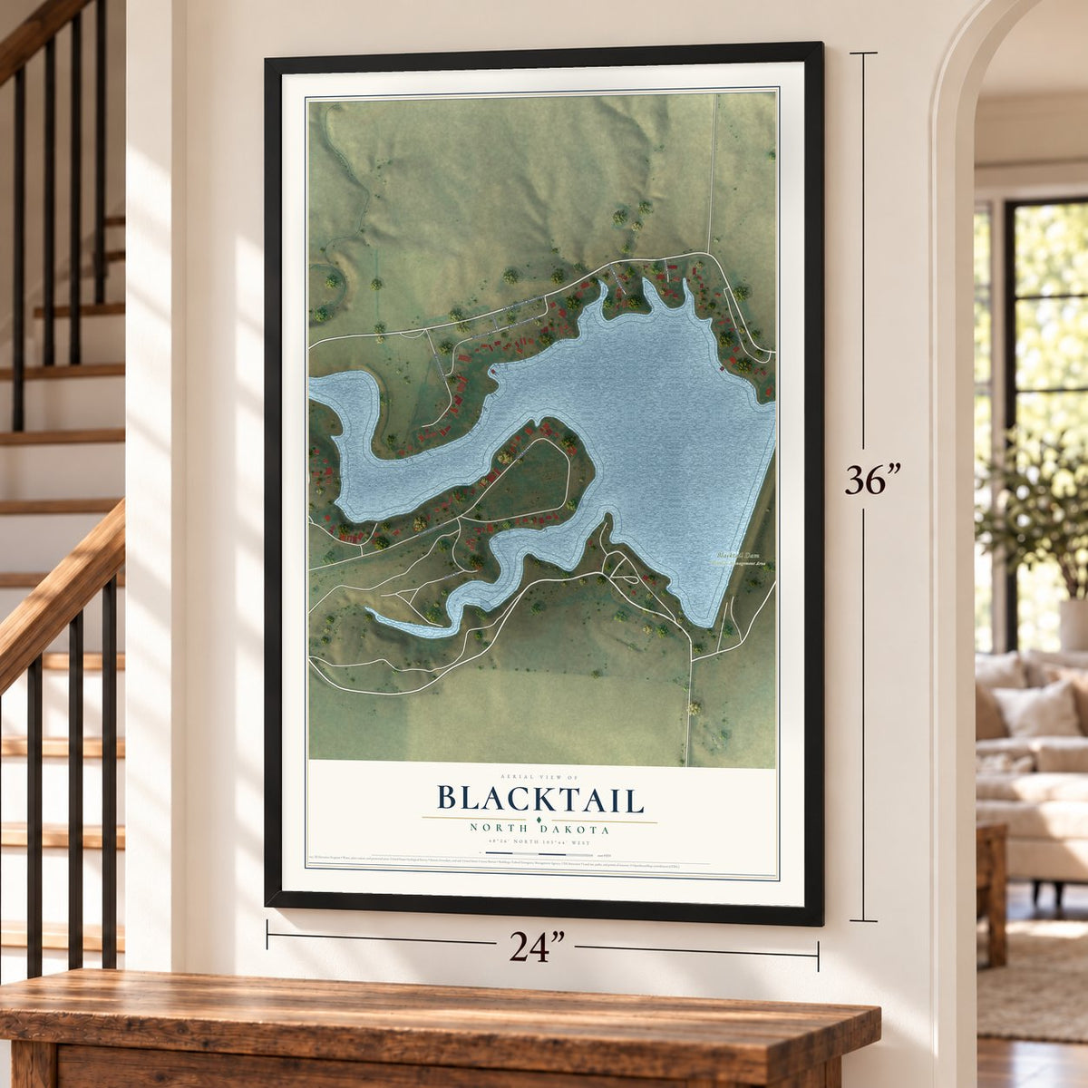 Blacktail, North Dakota map, 24 x 36 inch print in a black frame by a staircase