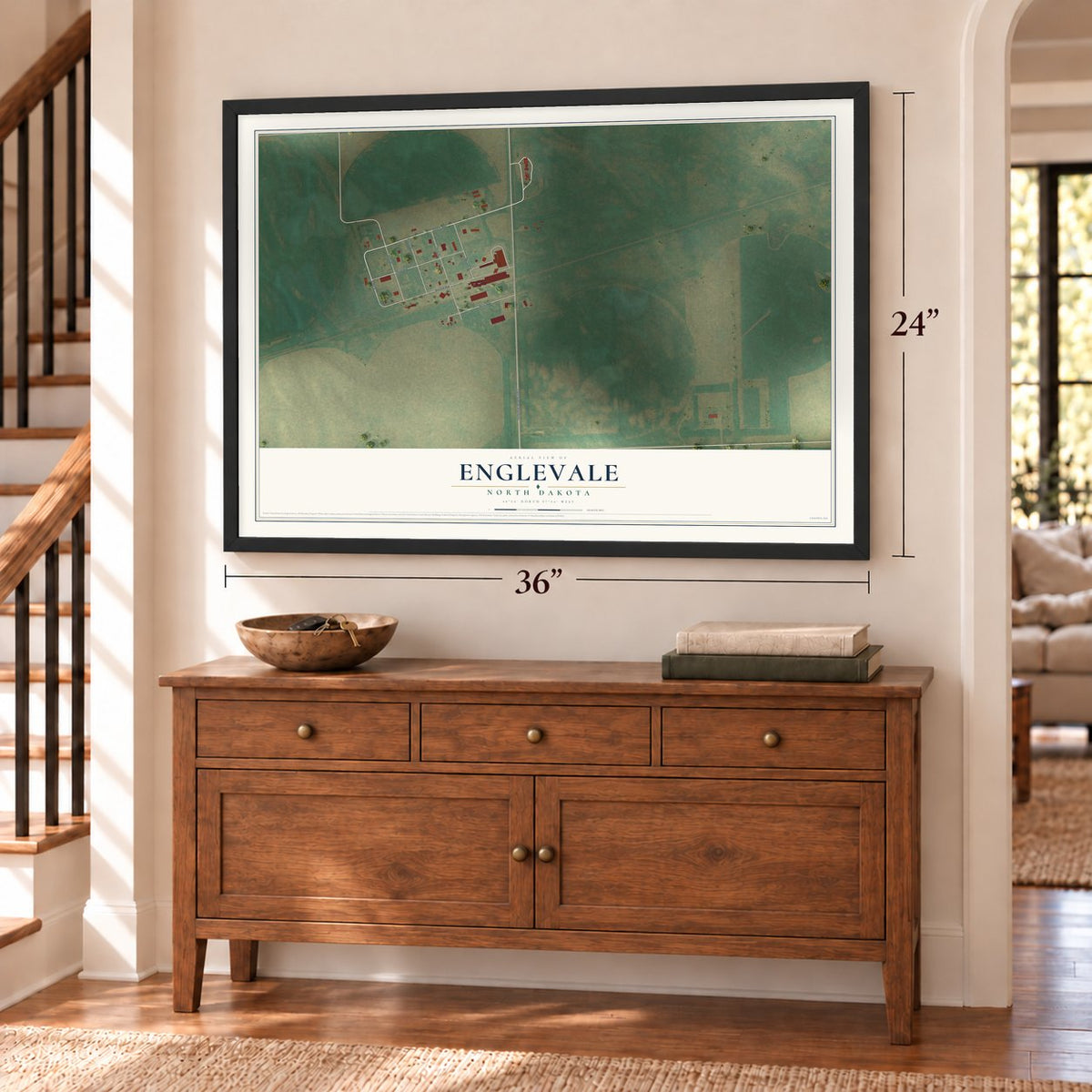 Englevale, North Dakota map, 24 x 36 inch print in a black frame above a dresser by a staircase