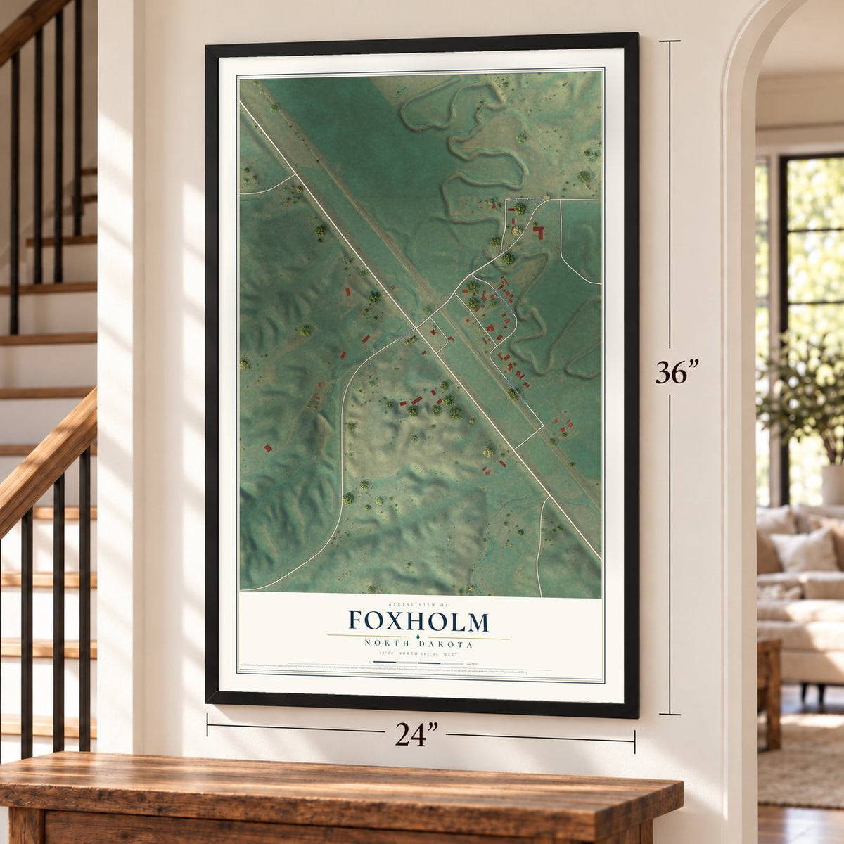 Foxholm, North Dakota map, 24 x 36 inch print in a black frame by a staircase