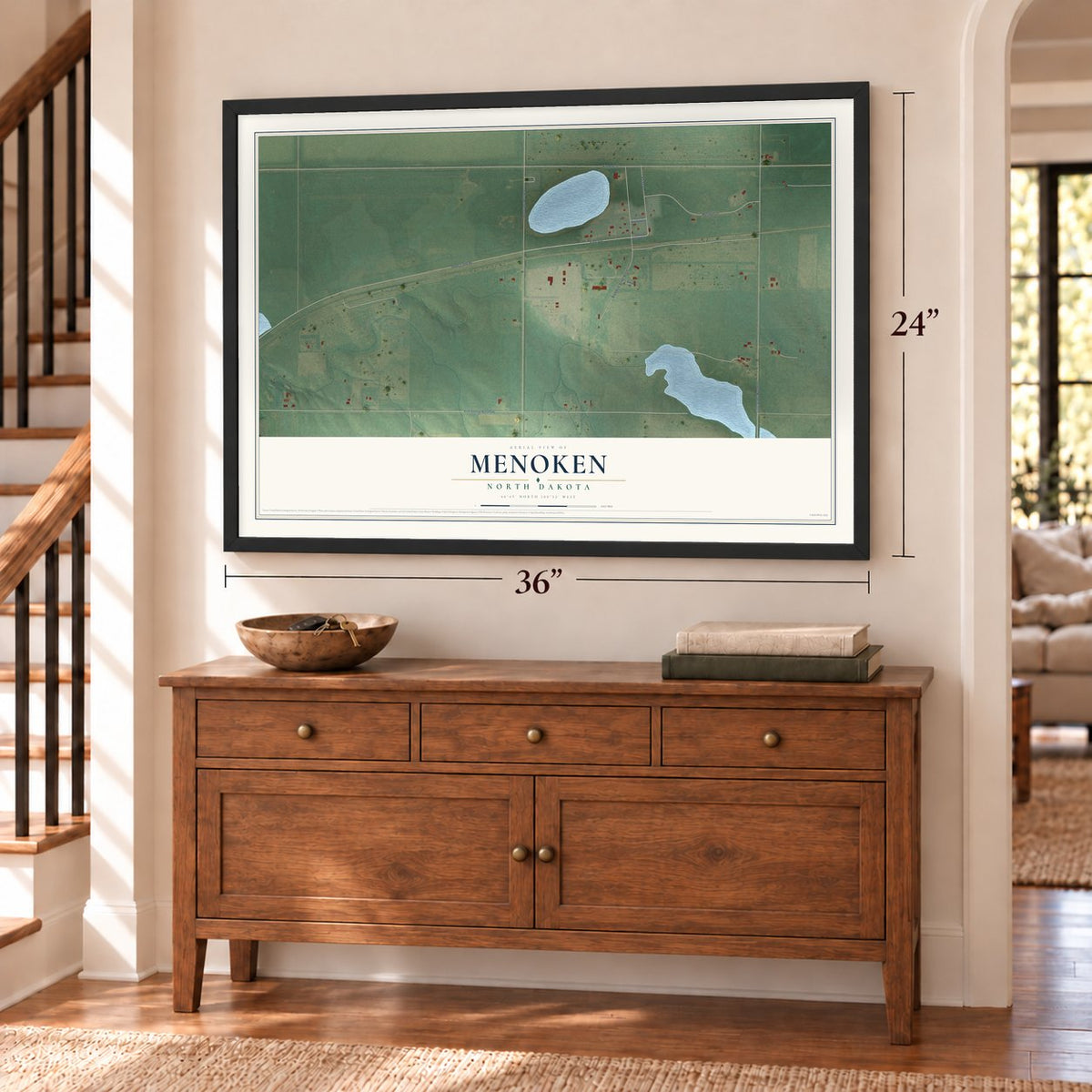 Menoken, North Dakota map, 24 x 36 inch print in a black frame above a dresser by a staircase