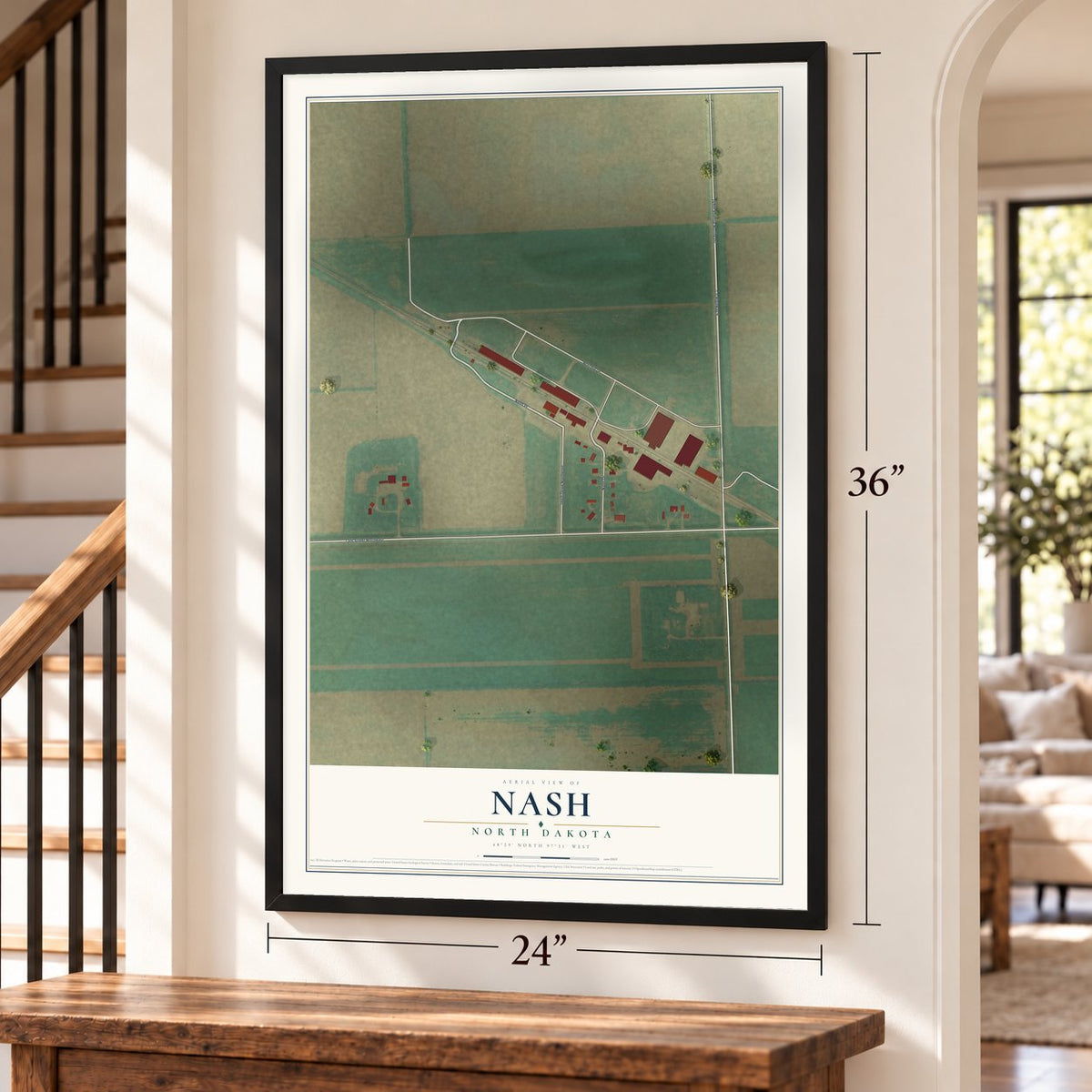 Nash, North Dakota map, 24 x 36 inch print in a black frame by a staircase
