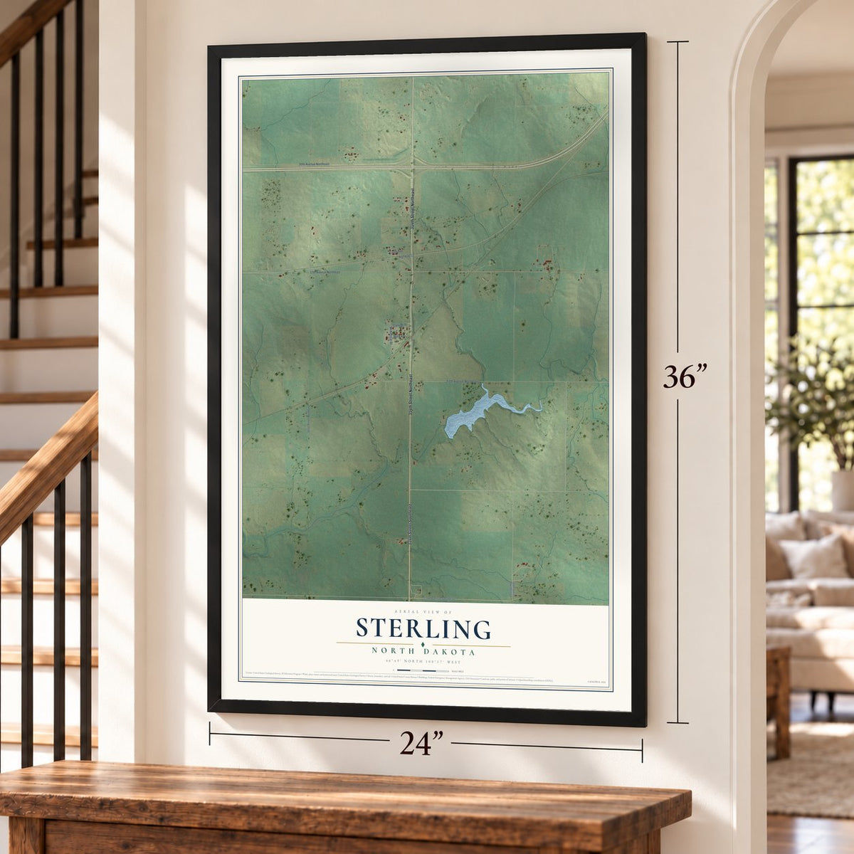 Sterling, North Dakota map, 24 x 36 inch print in a black frame by a staircase