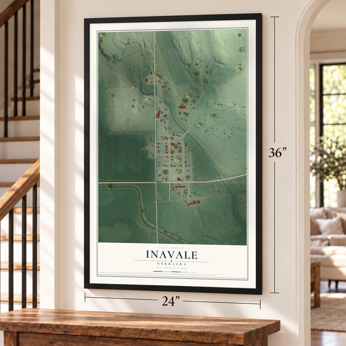Inavale, Nebraska map, 24 x 36 inch print in a black frame by a staircase
