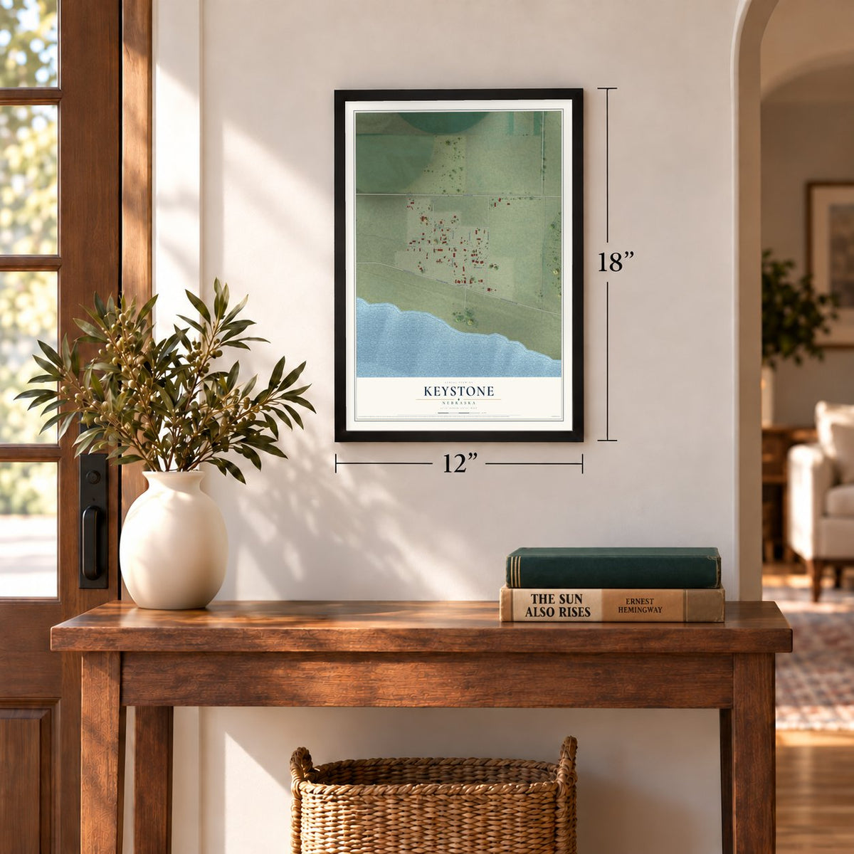 Keystone, Nebraska map, 12 x 18 inch print in a black frame in an entryway