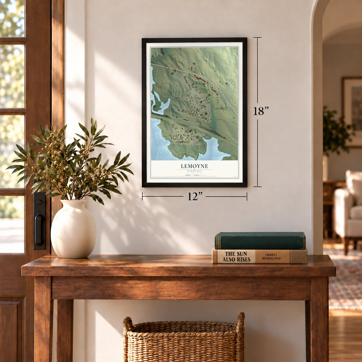 Lemoyne, Nebraska map, 12 x 18 inch print in a black frame in an entryway