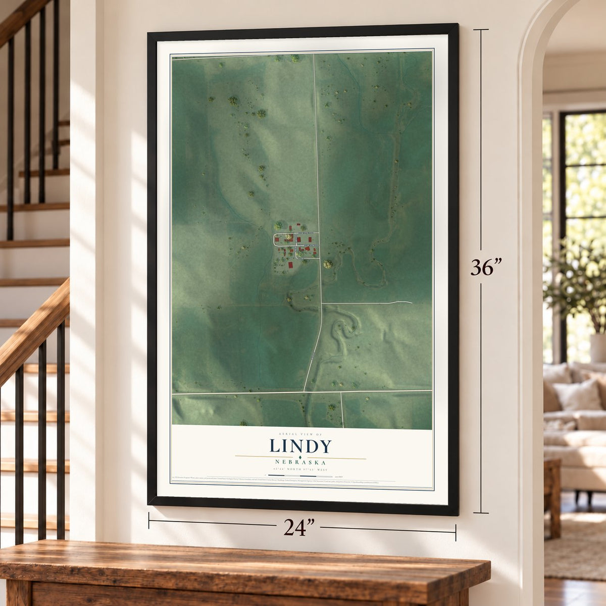Lindy, Nebraska map, 24 x 36 inch print in a black frame by a staircase
