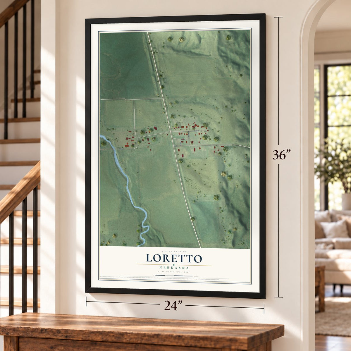 Loretto, Nebraska map, 24 x 36 inch print in a black frame by a staircase