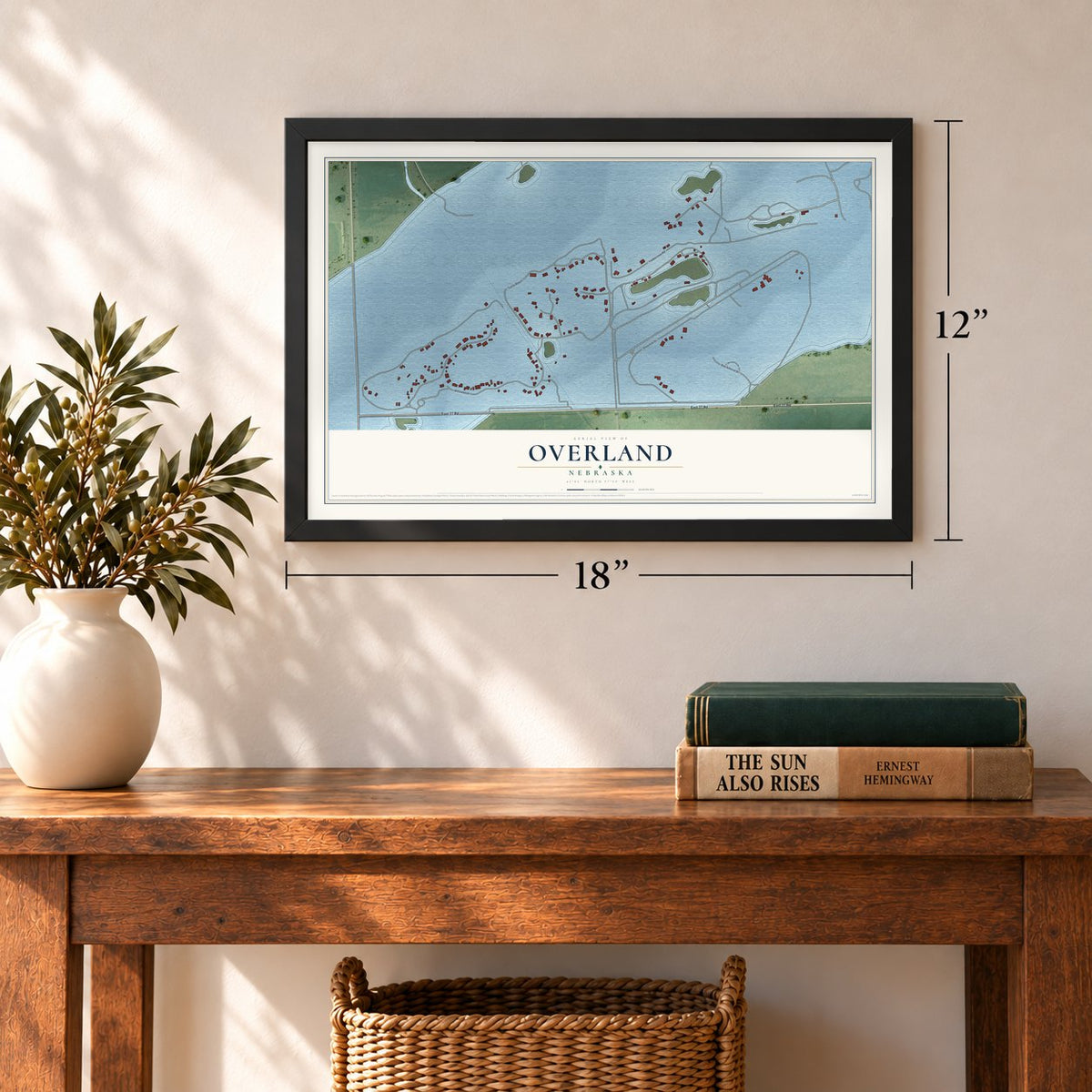 Overland, Nebraska map, 12 x 18 inch print in a black frame in an entryway