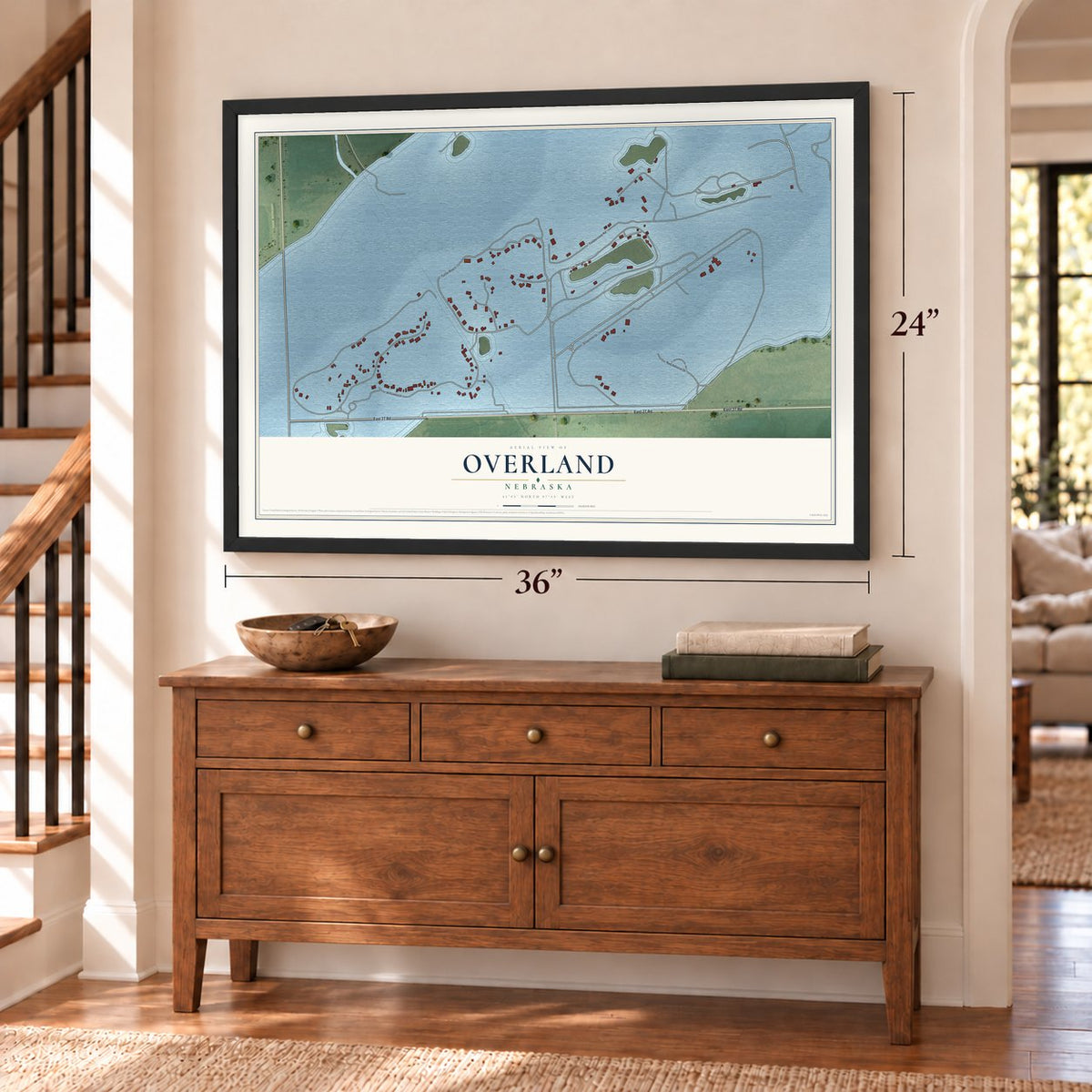 Overland, Nebraska map, 24 x 36 inch print in a black frame above a dresser by a staircase