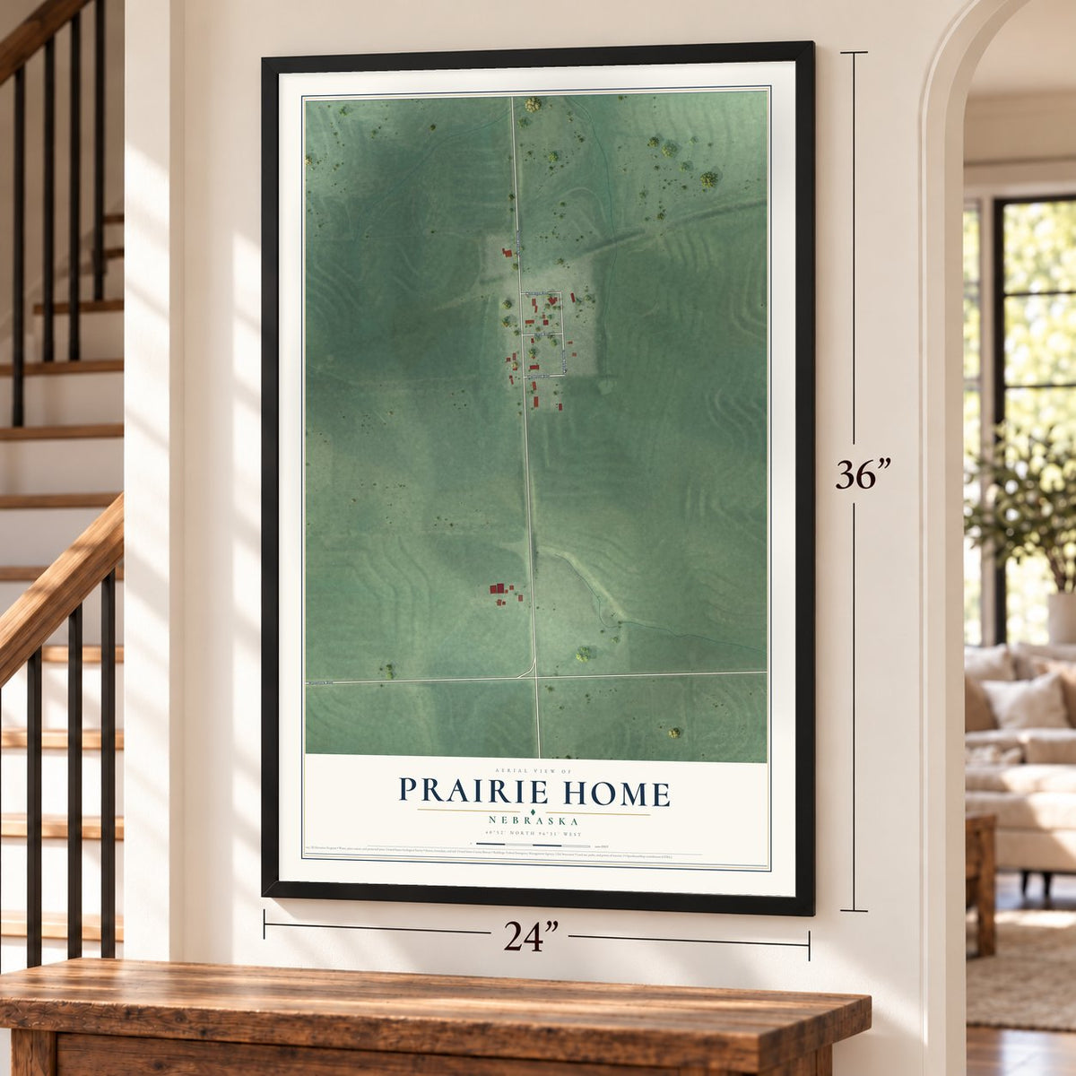 Prairie Home, Nebraska map, 24 x 36 inch print in a black frame by a staircase