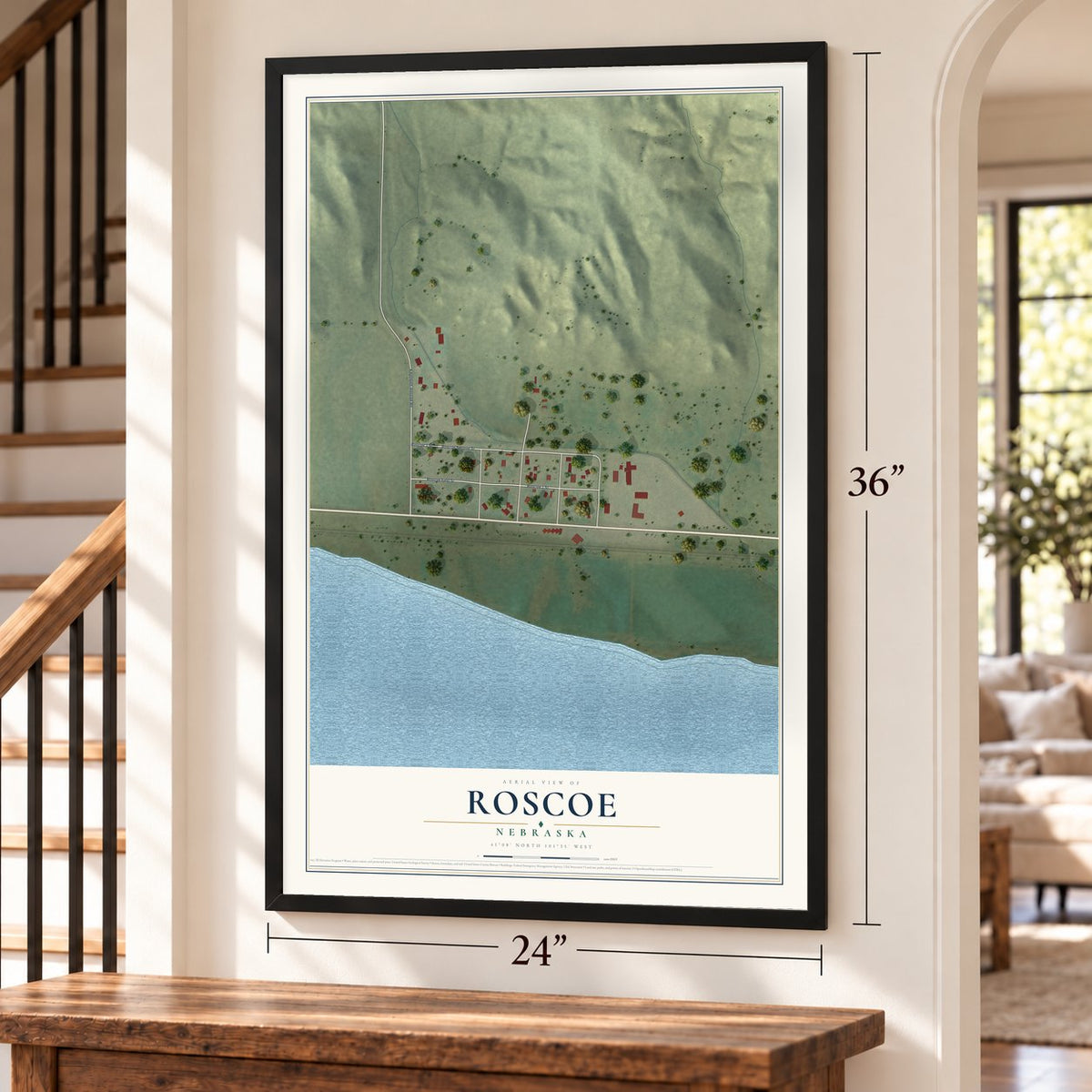 Roscoe, Nebraska map, 24 x 36 inch print in a black frame by a staircase