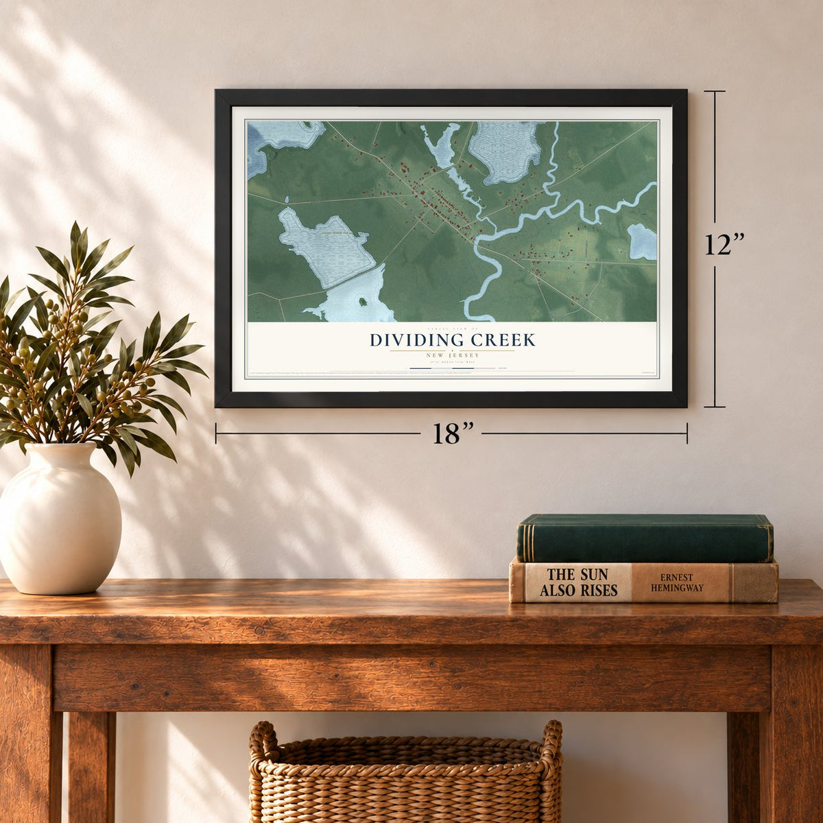 Dividing Creek, New Jersey map, 12 x 18 inch print in a black frame in an entryway
